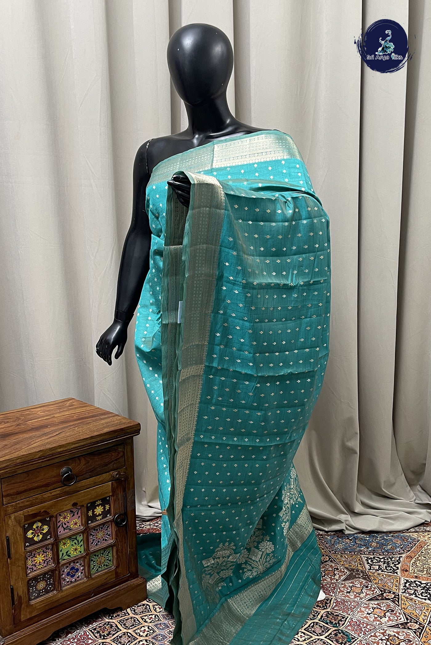 Teal Semi Tussar Saree With Zari Buttas Pattern