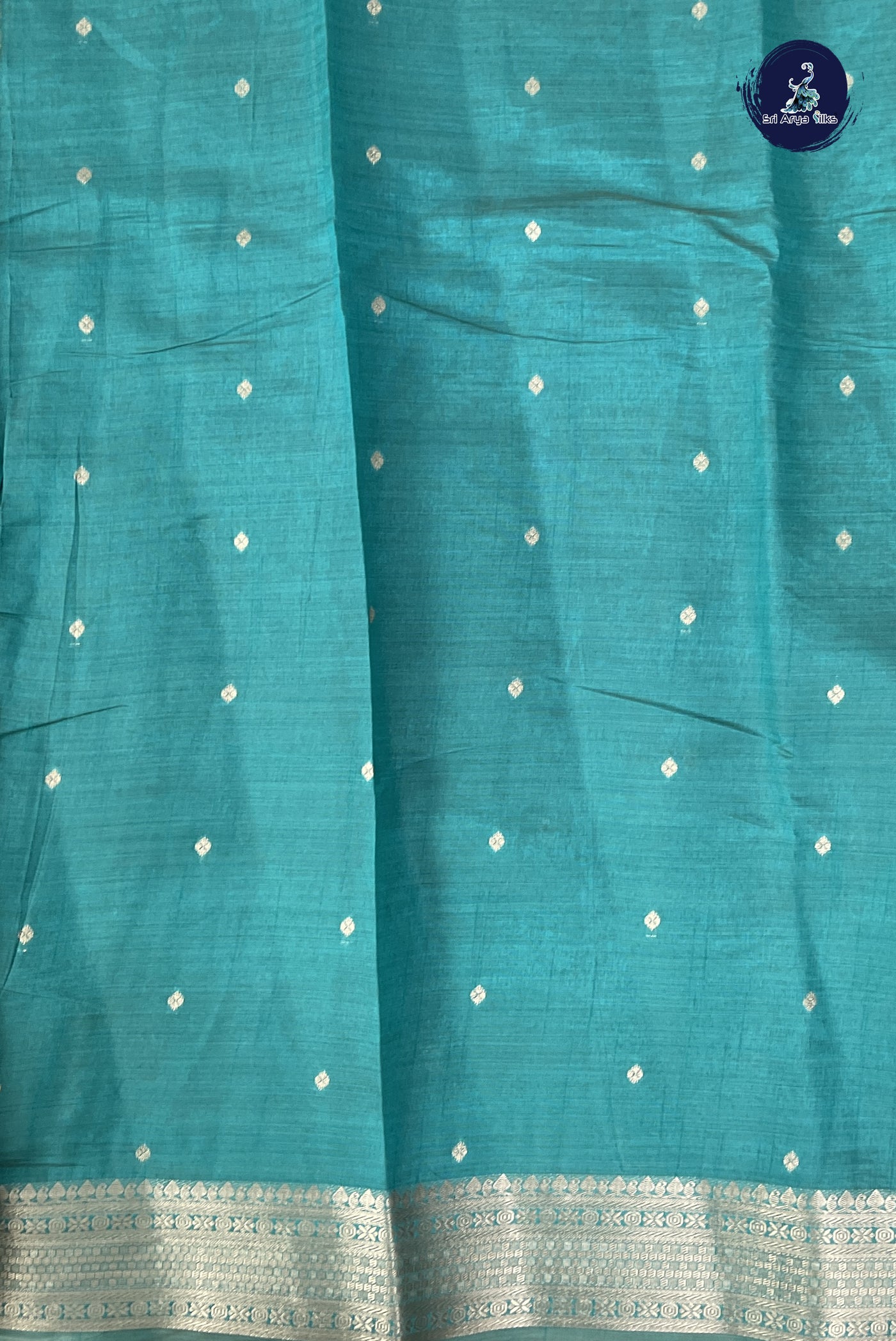 Teal Semi Tussar Saree With Zari Buttas Pattern