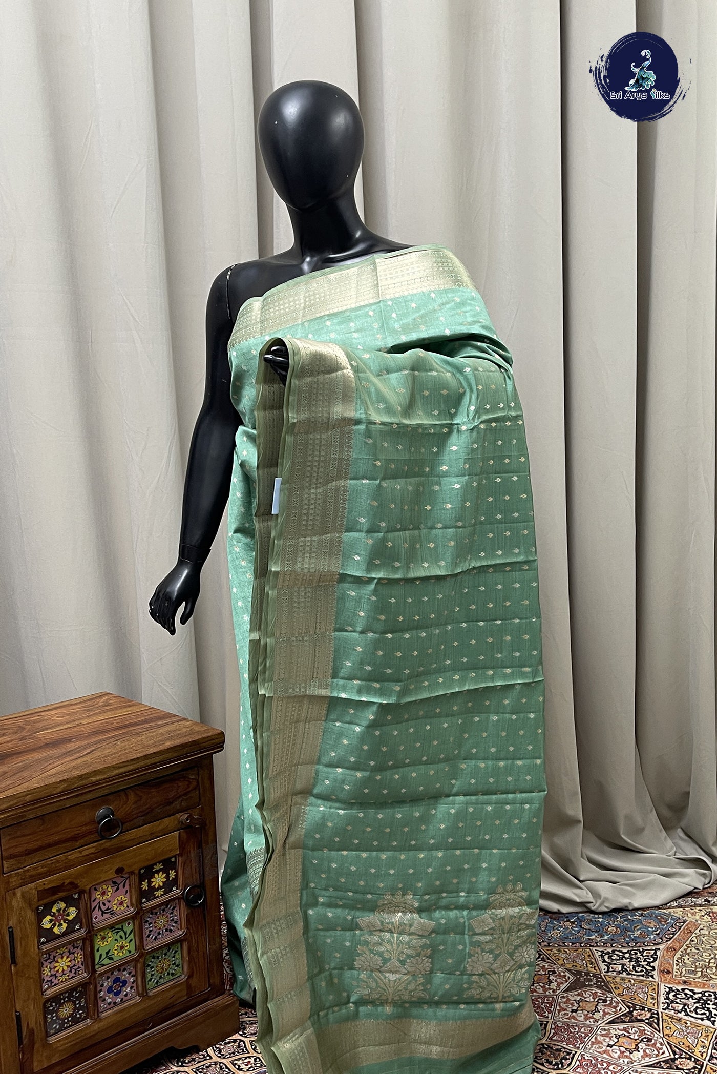 Pastel Green Semi Tussar Saree With Zari Buttas Pattern