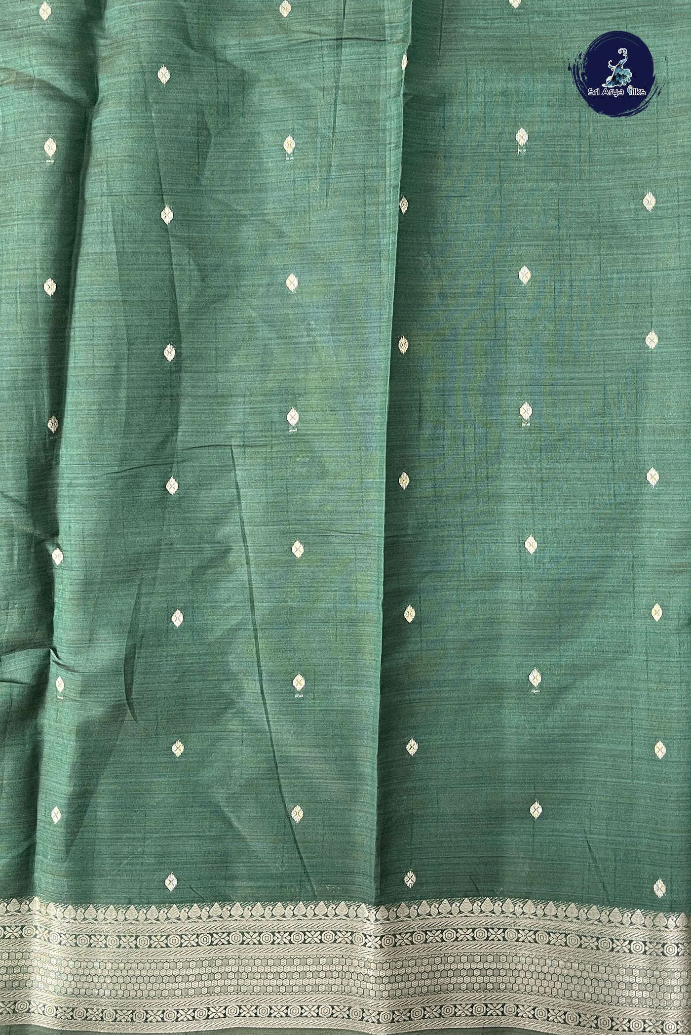 Dark Green Semi Tussar Saree With Zari Buttas Pattern