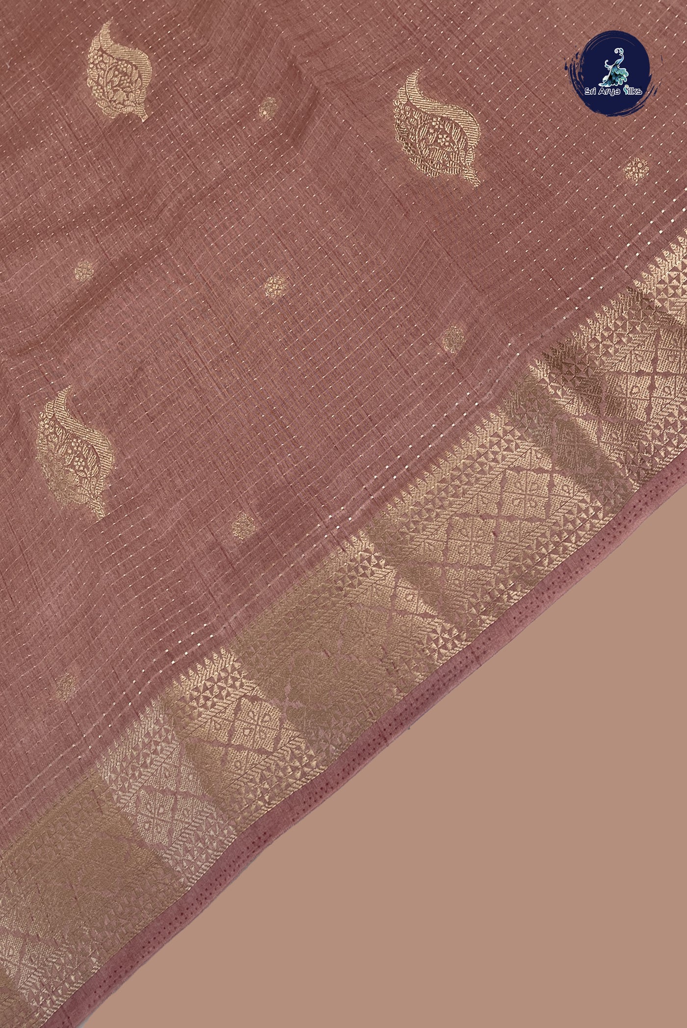 Dusty Pink Semi Tussar Saree With Zari Buttas Pattern