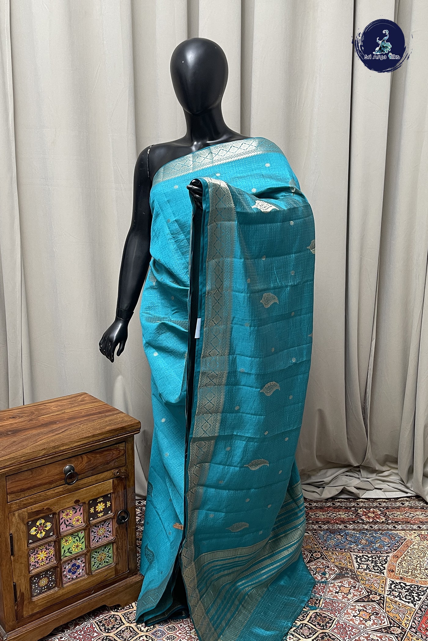 Teal Blue Semi Tussar Saree With Zari Buttas Pattern