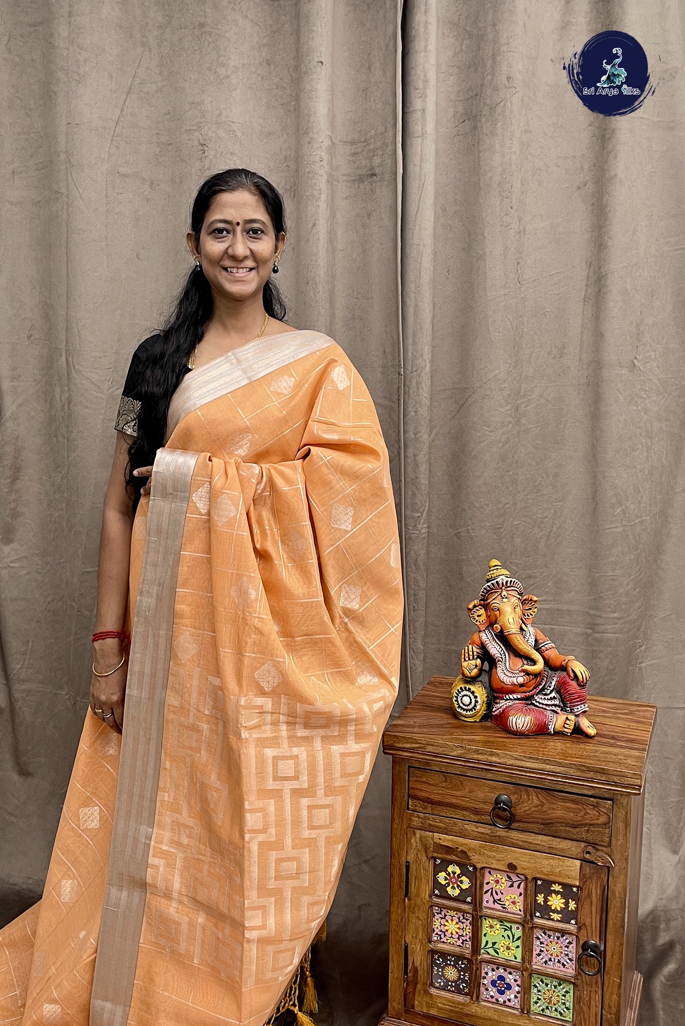 Peach Function Wear Saree With Zari Woven Pattern