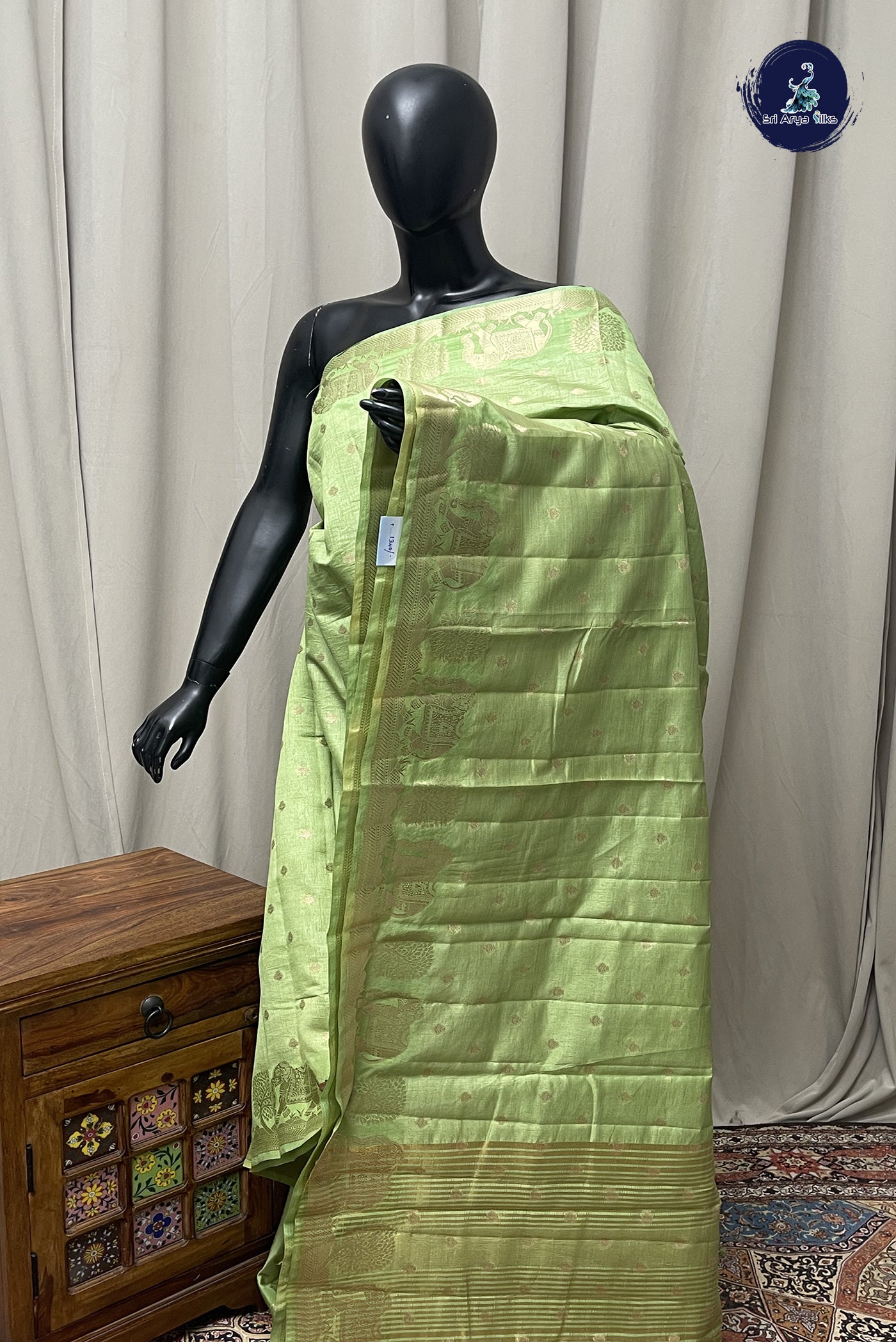 Pista Green Semi Tussar Saree With Zari Buttas Pattern