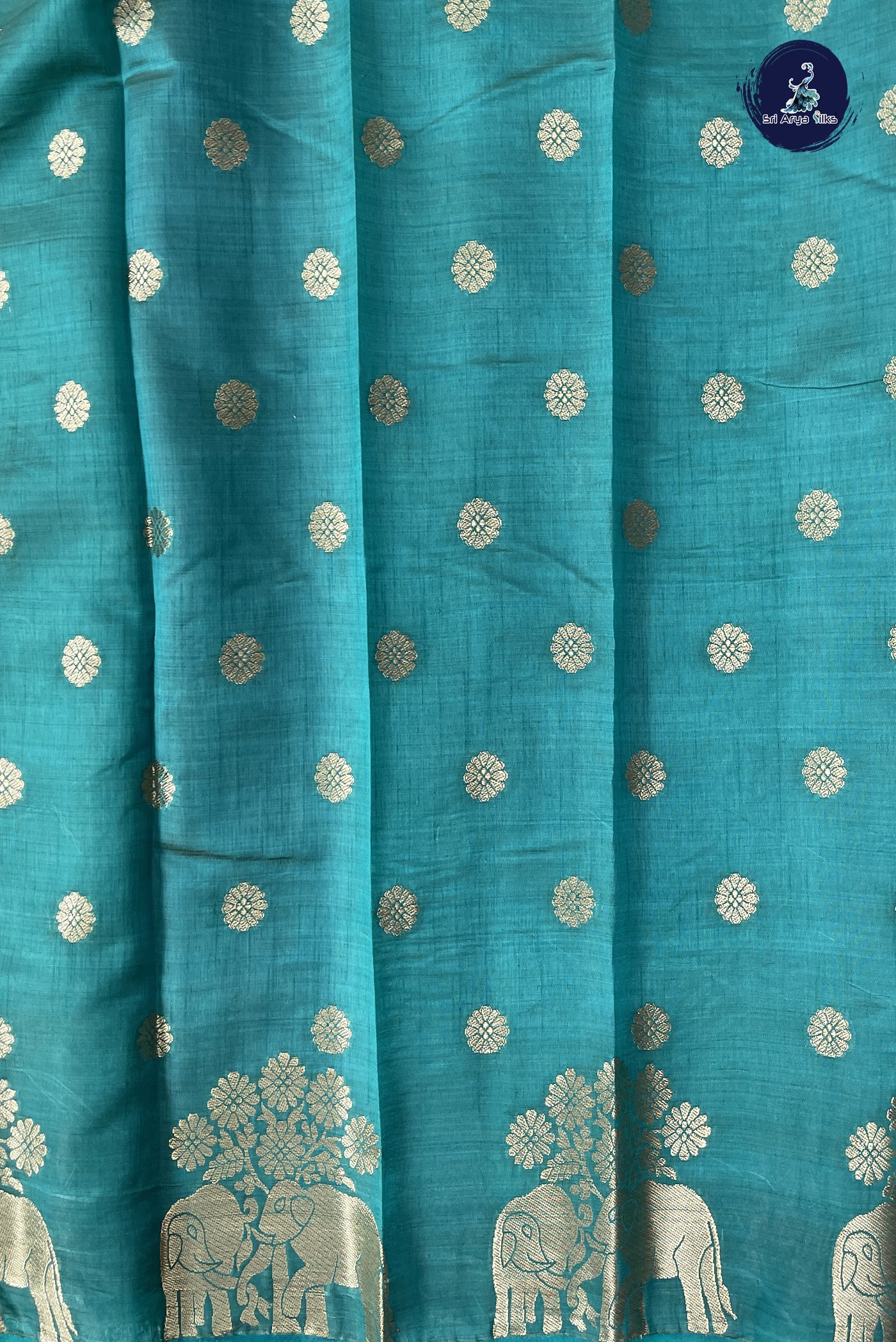 Teal Semi Tussar Saree With Zari Buttas Pattern