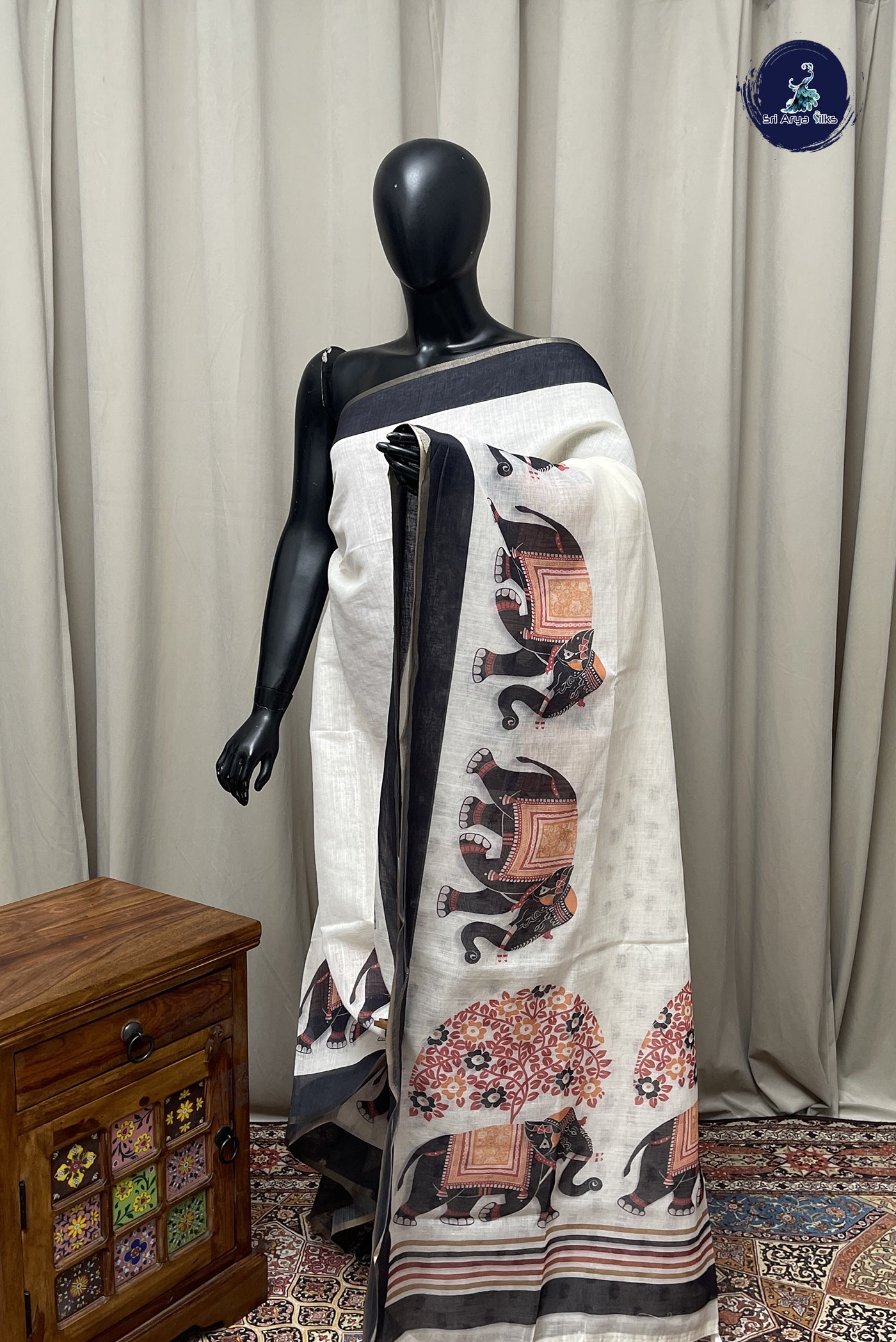 White Linen Saree With Printed Pattern