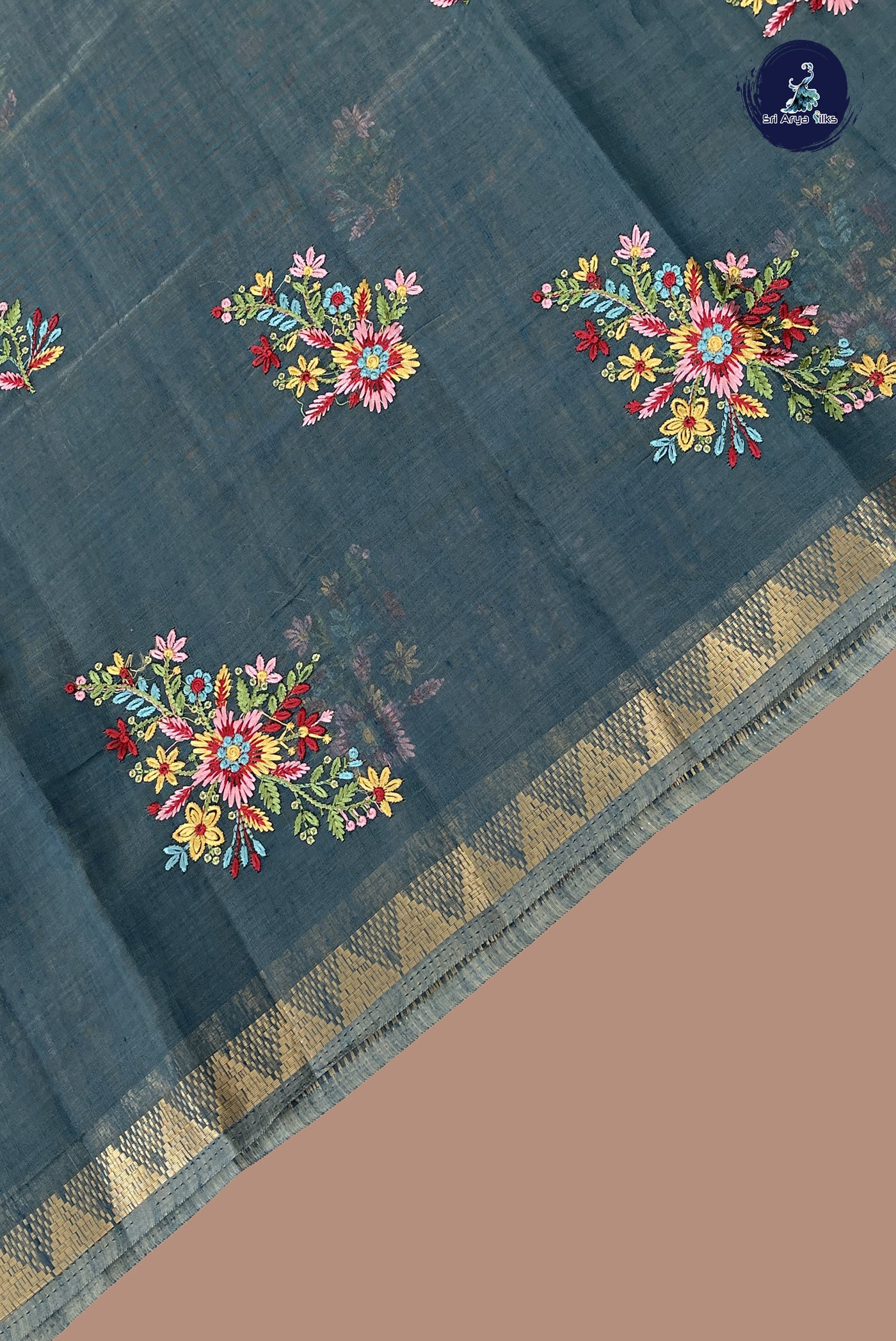 Teal Blue Linen Saree With Embroidery Pattern