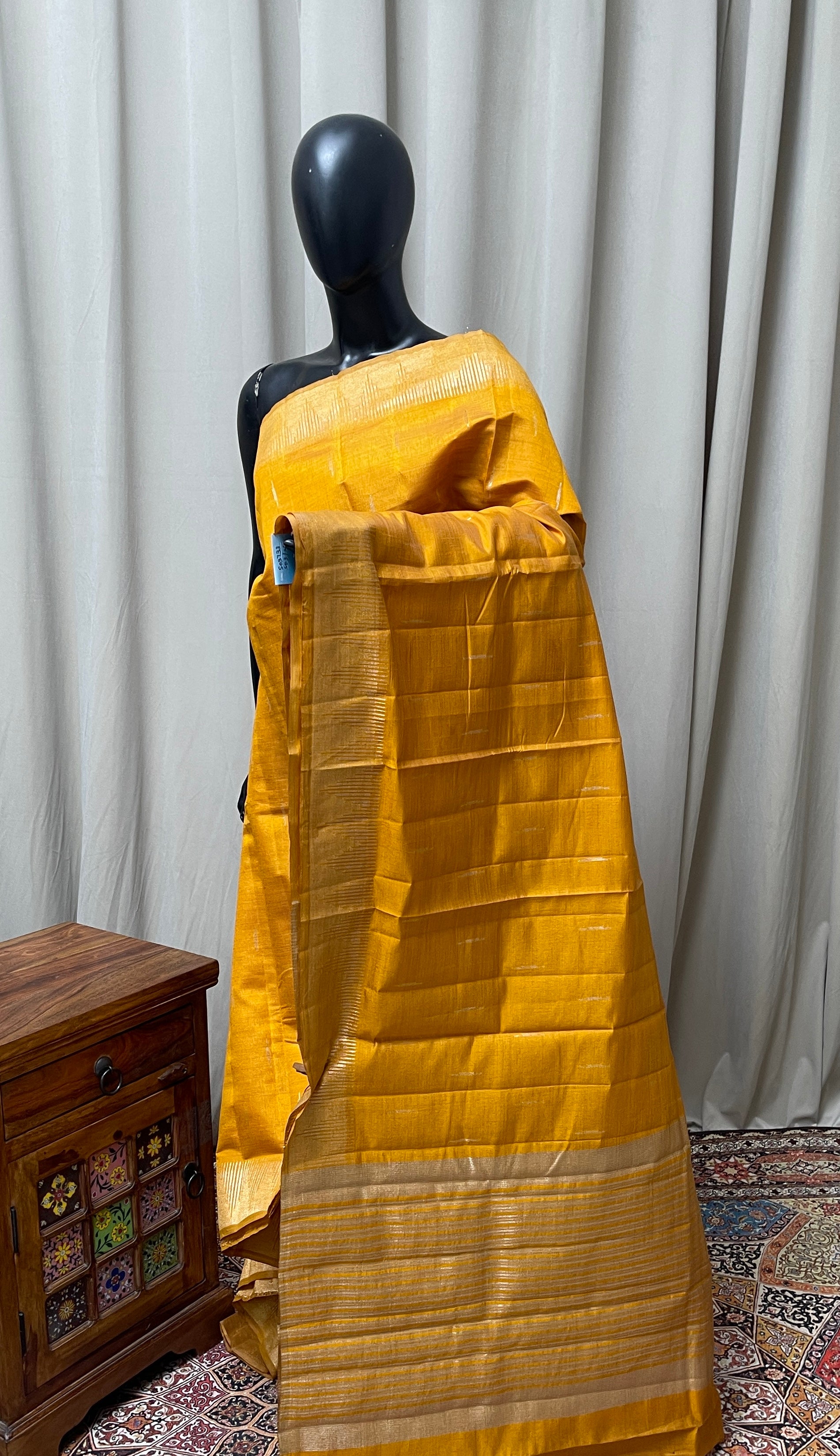 Lite Mustard Orange Semi Tussar Saree With Zari Buttas Pattern