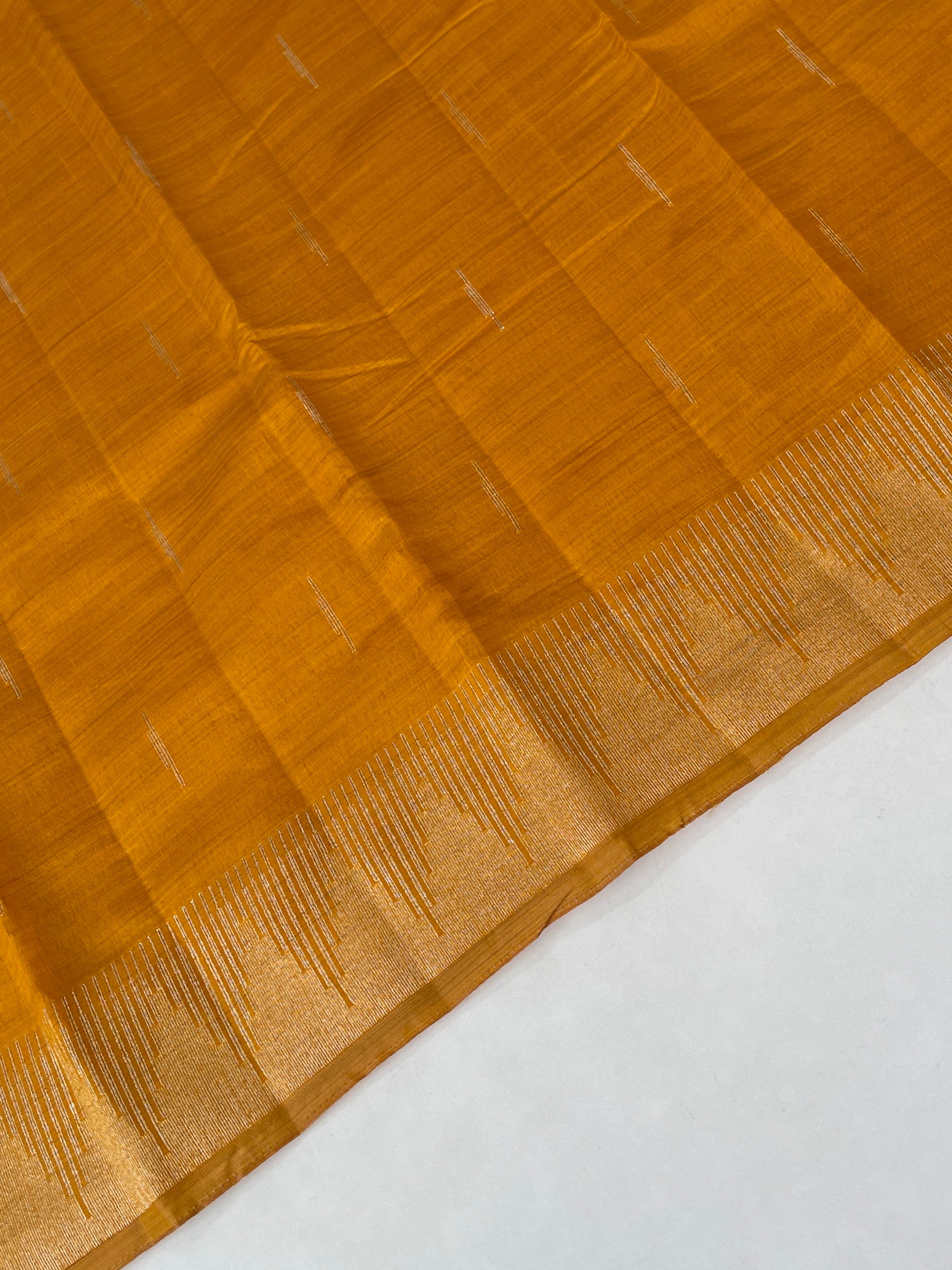 Lite Mustard Orange Semi Tussar Saree With Zari Buttas Pattern