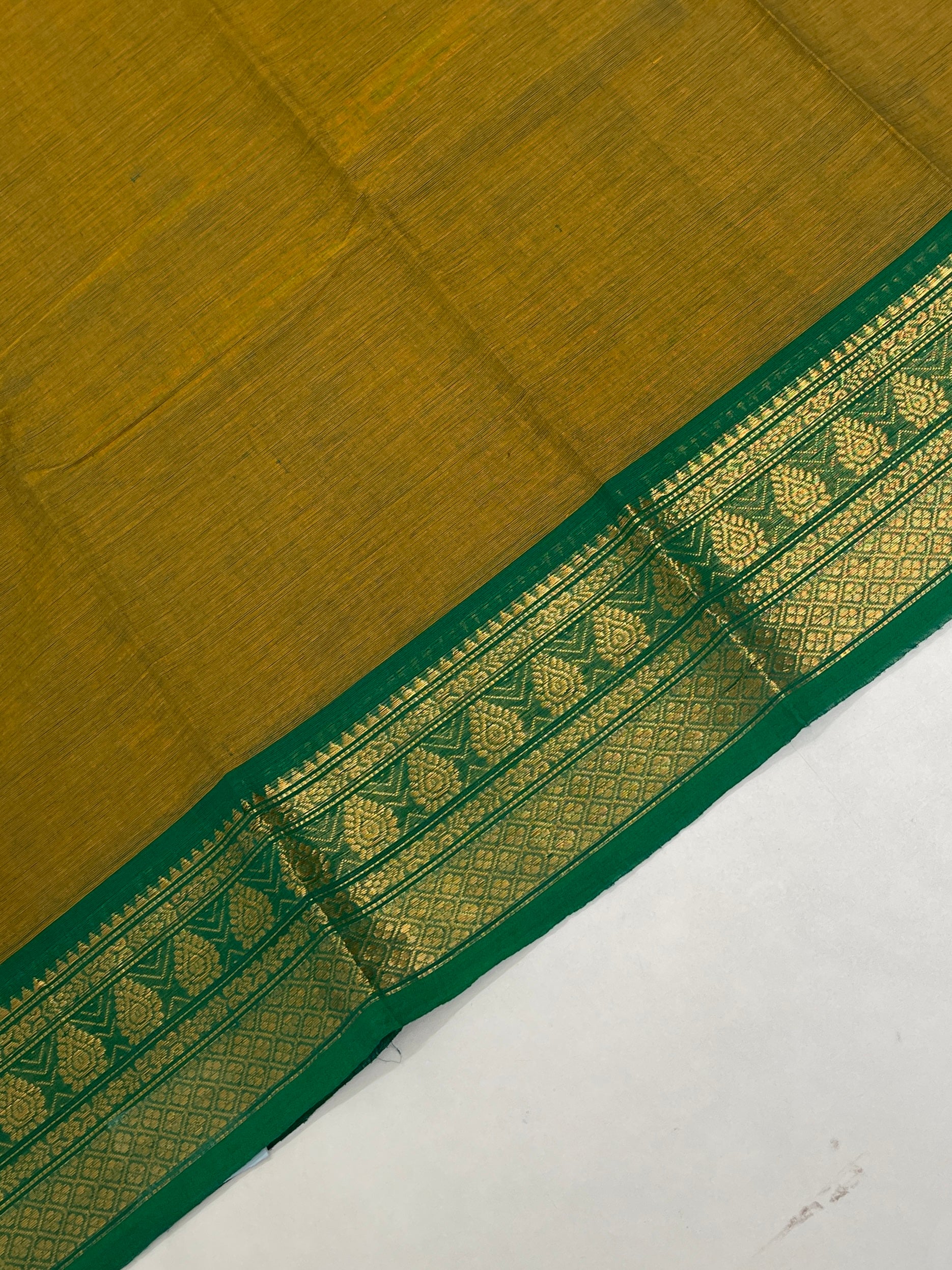 Yellowish Green Kanchi Cotton Saree With Plain Pattern
