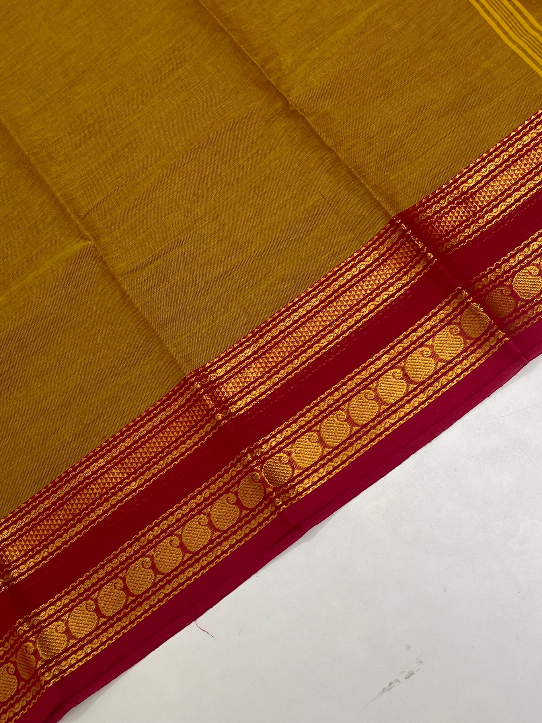 Mustard Kanchi Cotton Saree With Plain Pattern