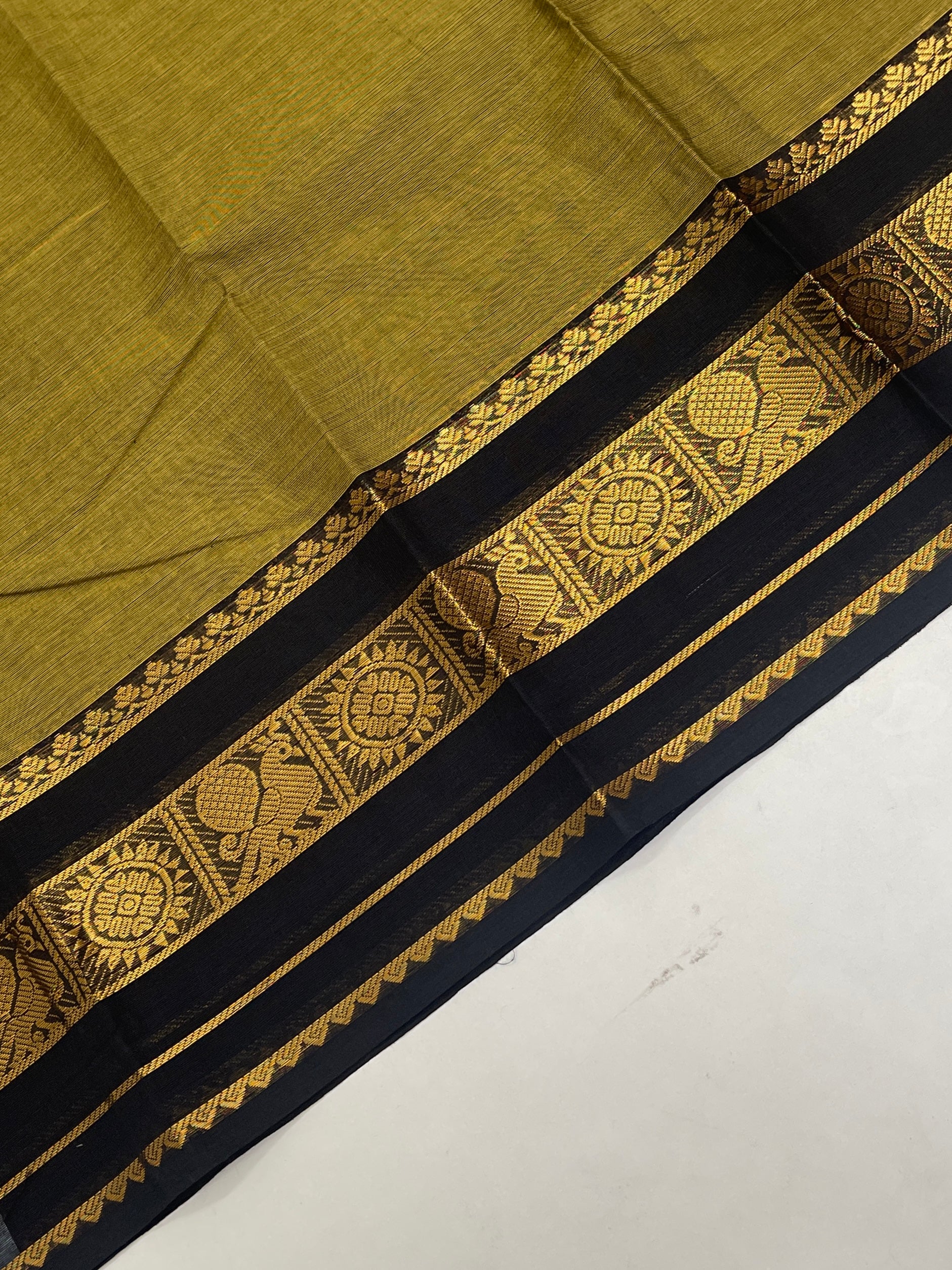 Mehendi Green Kanchi Cotton Saree With Plain Pattern