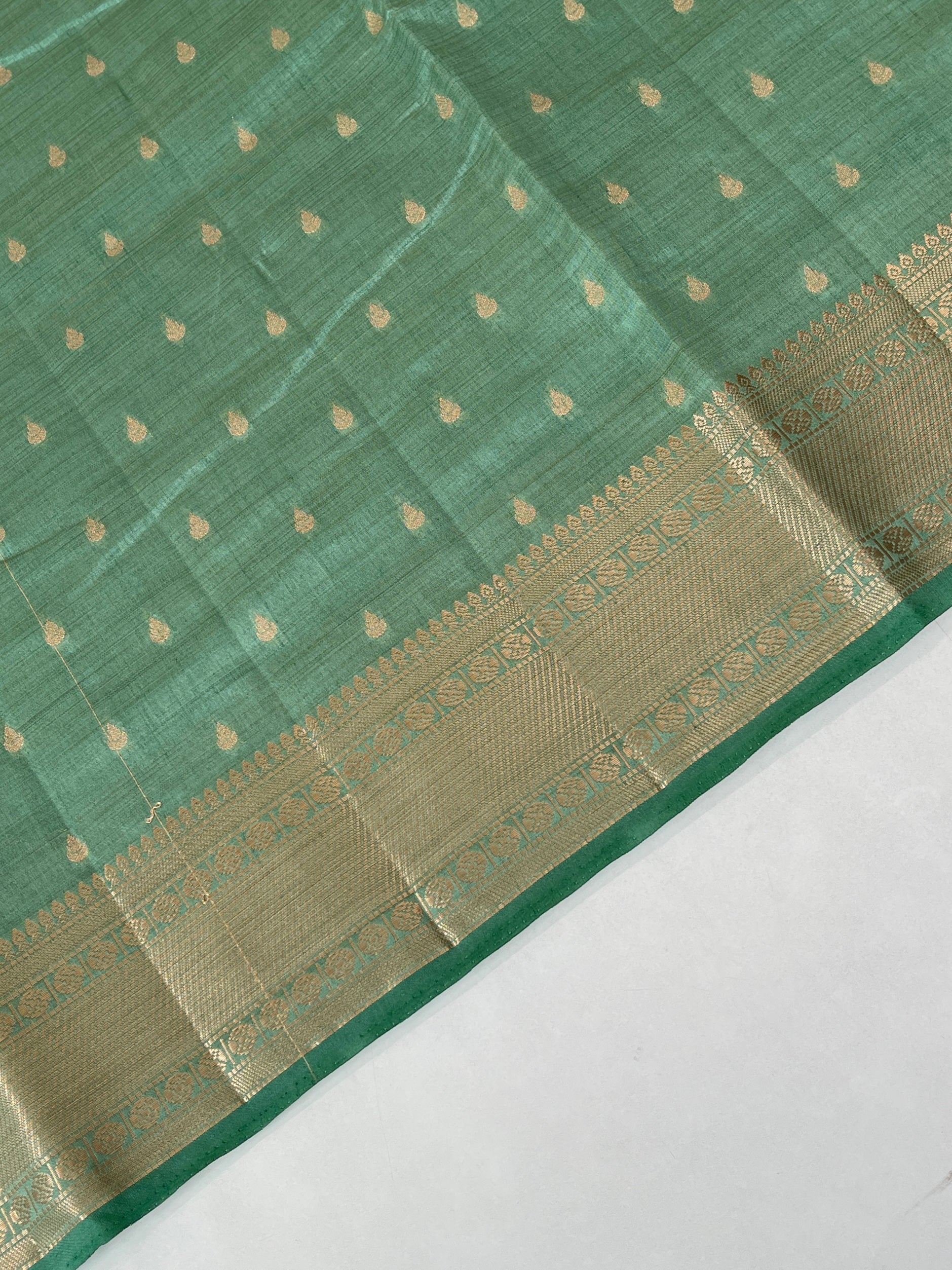 Pastel Green Semi Tussar Saree With Zari Buttas Pattern