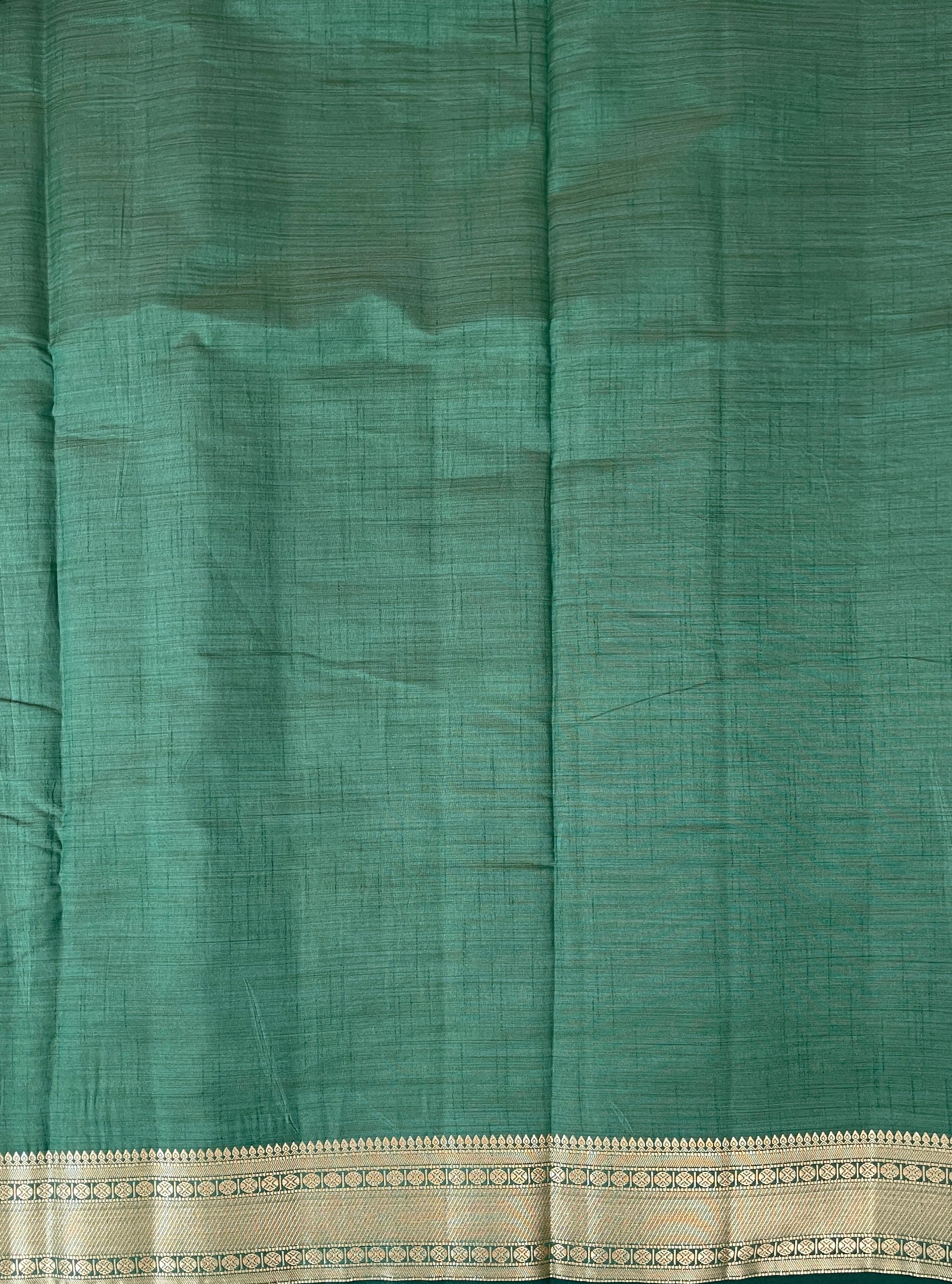 Dark Green Semi Tussar Saree With Zari Buttas Pattern