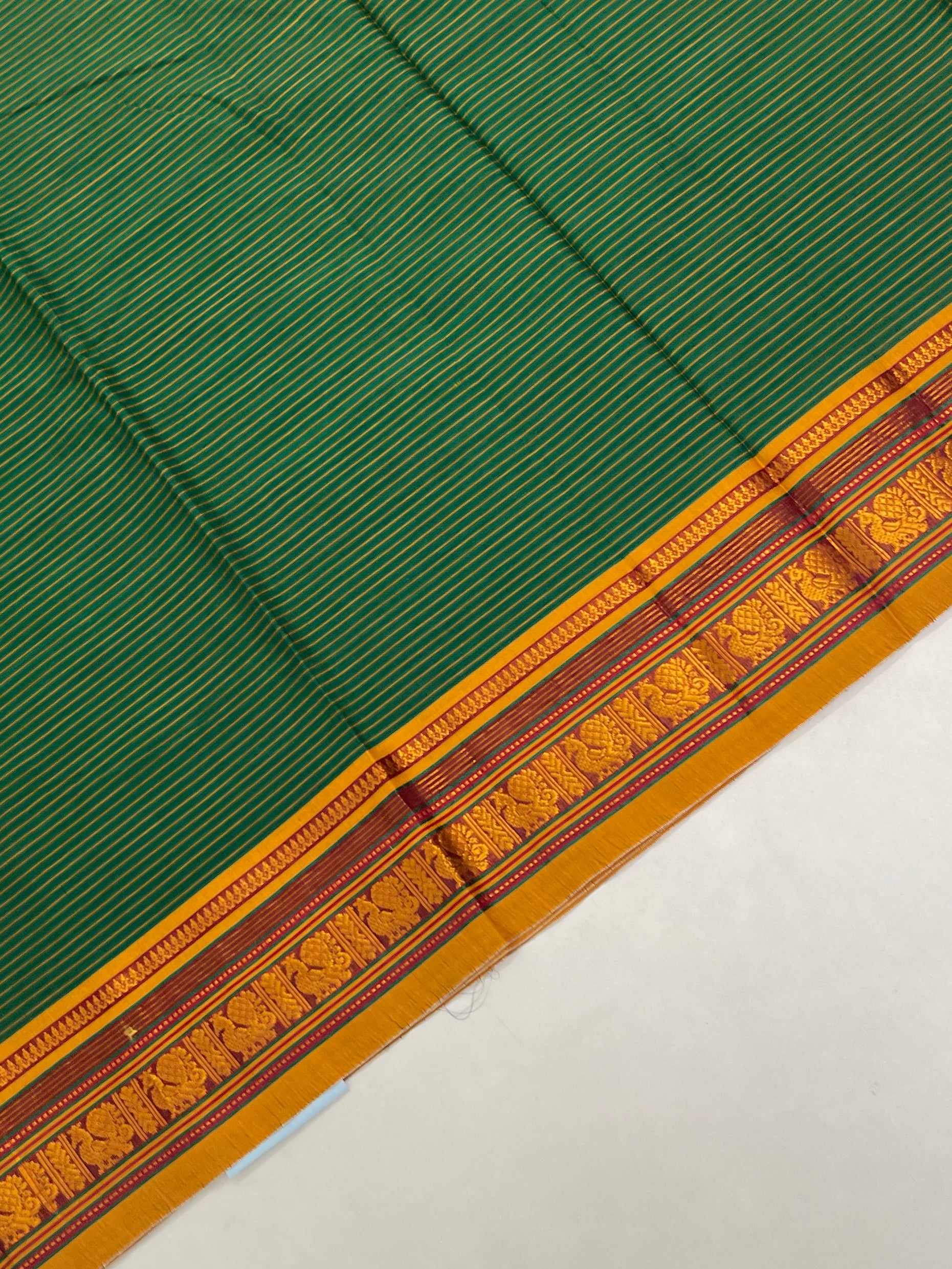 Dark Green Budget Semi Silk Cotton Saree With Doria Lines Pattern