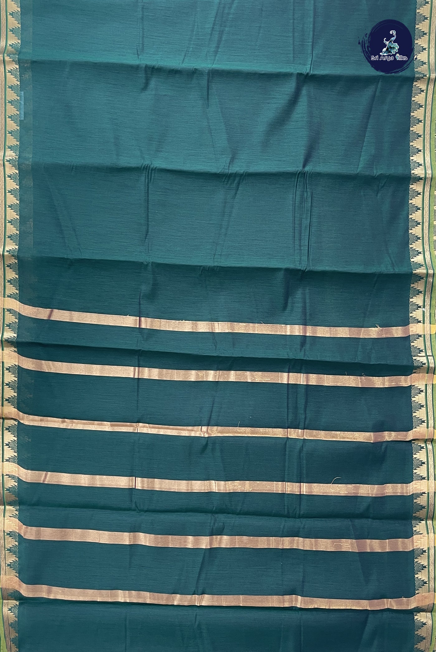 Bottle Green Budget Semi Silk Cotton Saree With Plain Pattern