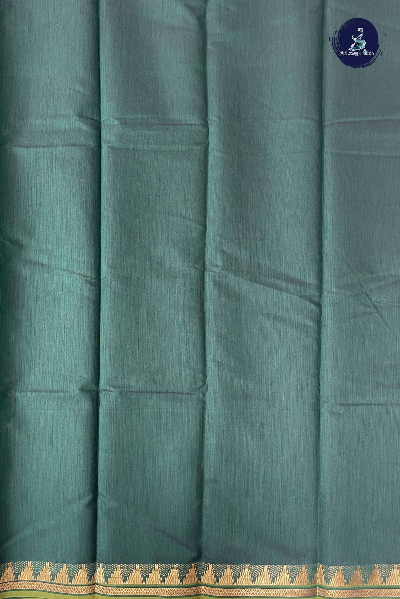 Bottle Green Budget Semi Silk Cotton Saree With Plain Pattern