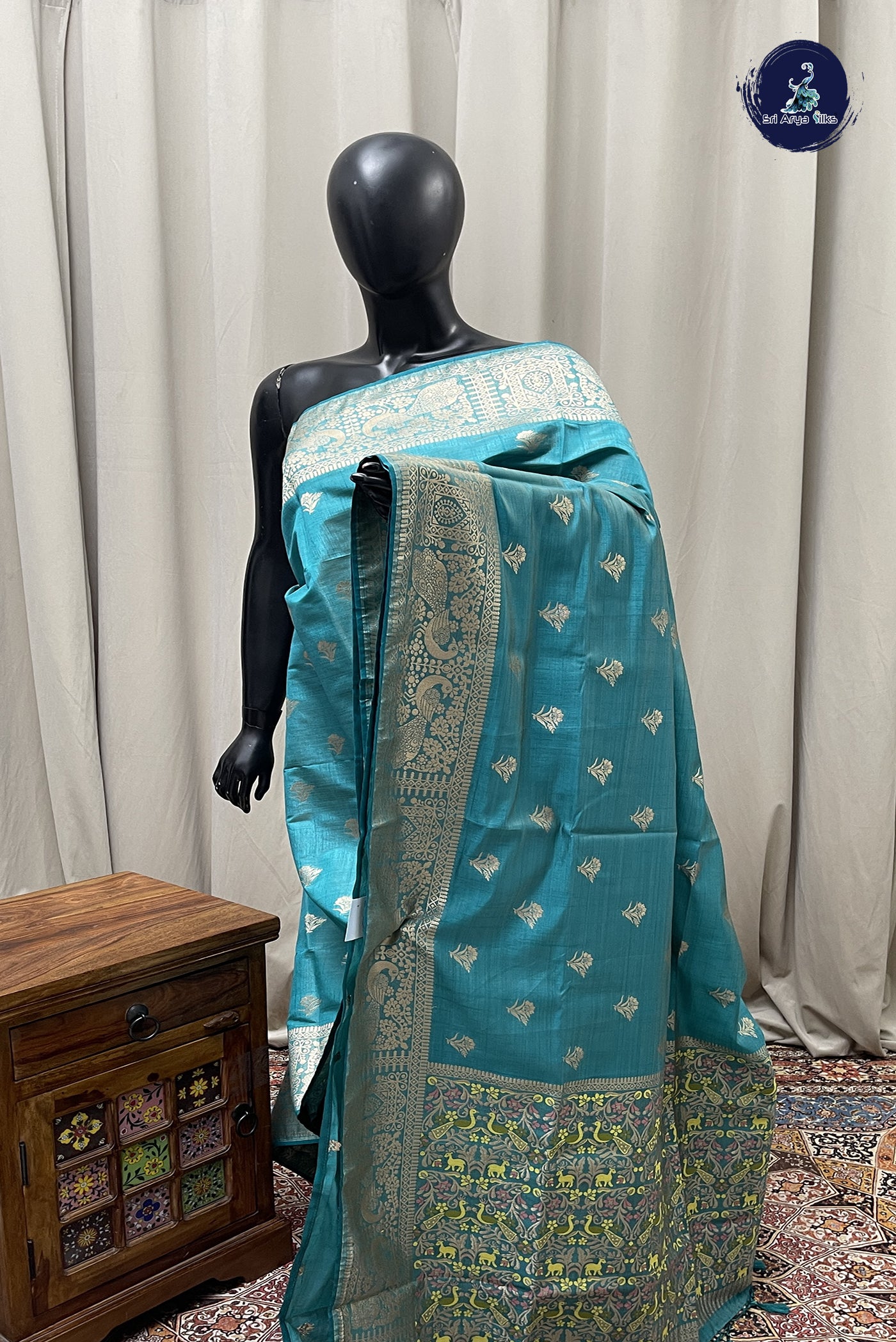 Teal Blue Semi Tussar Saree With Zari Buttas Pattern