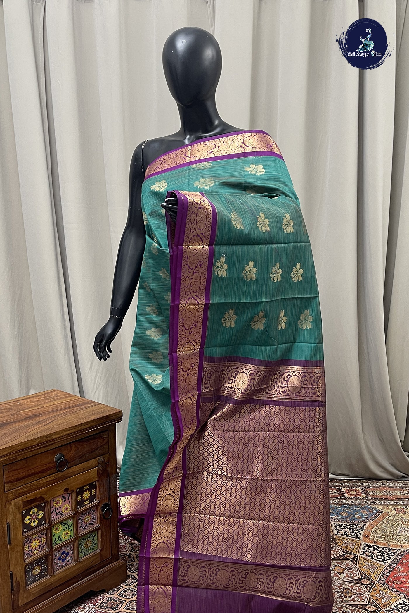 Teal Budget Semi Silk Cotton Saree With Zari Buttas Pattern