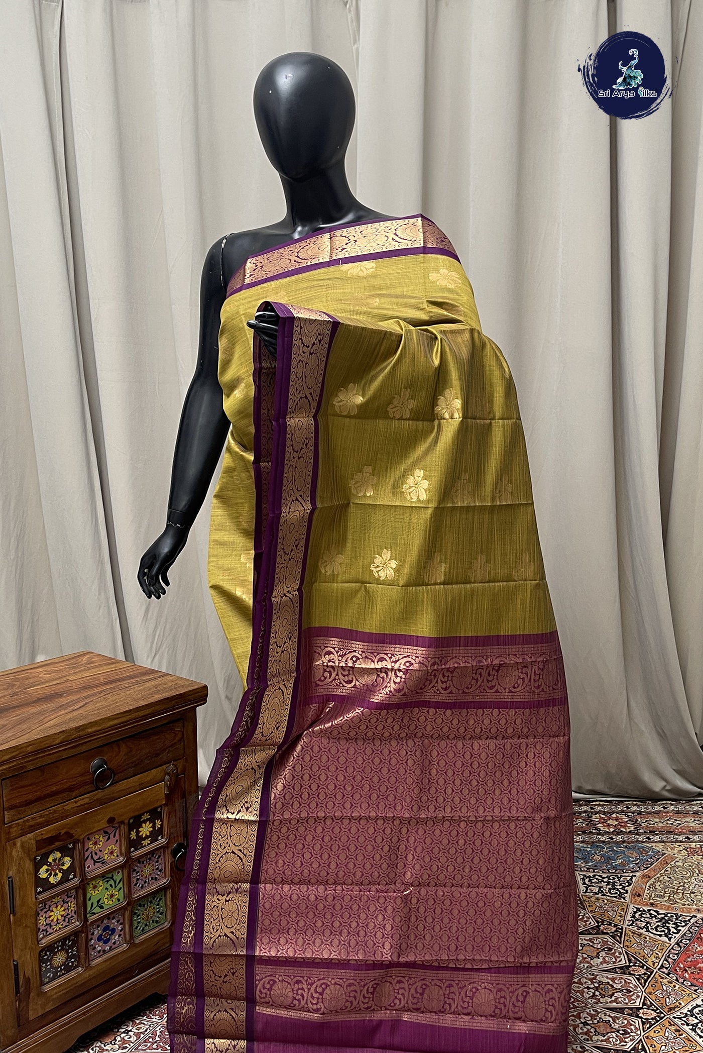 Mehendi Green Budget Semi Silk Cotton Saree With Zari Buttas Pattern