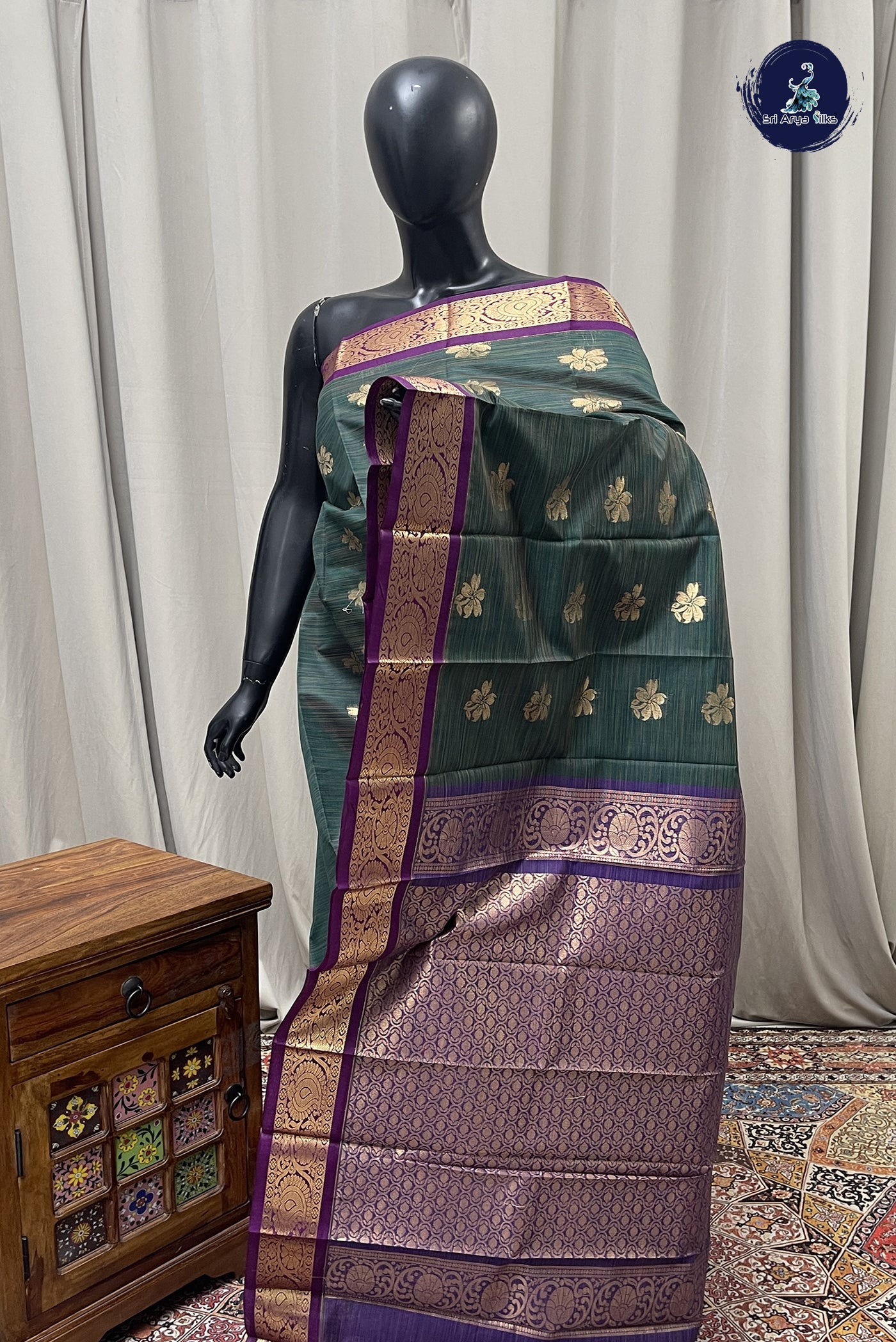 Bottle Green Budget Semi Silk Cotton Saree With Zari Buttas Pattern