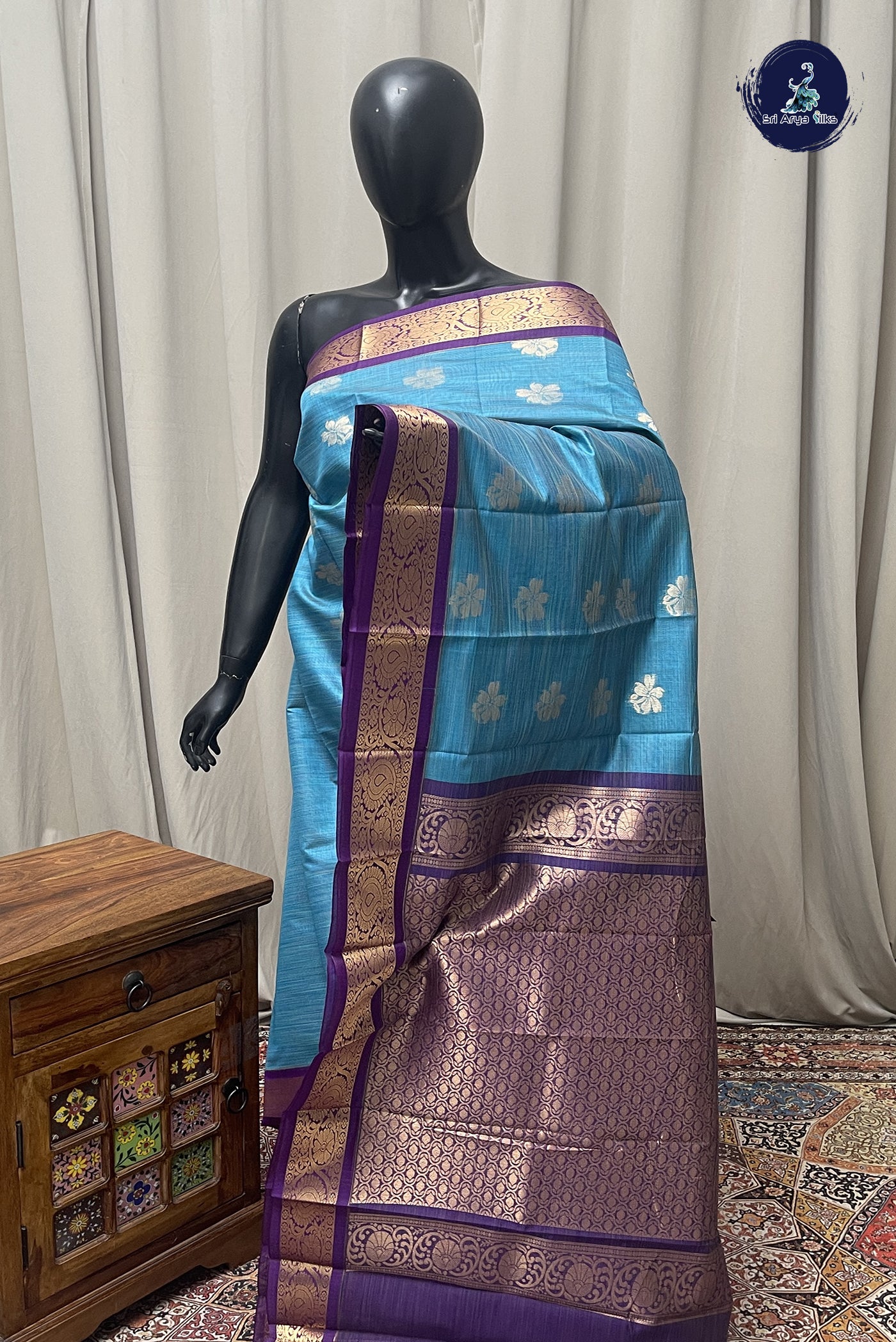 Copper Sulphate Blue Budget Semi Silk Cotton Saree With Zari Buttas Pattern