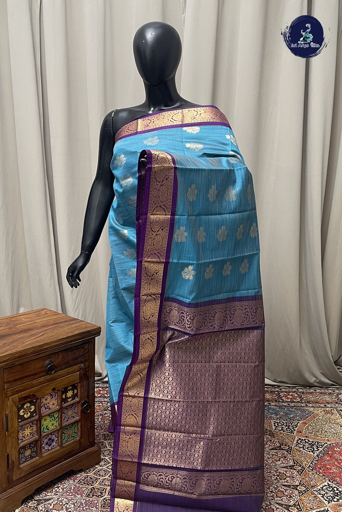 Copper Sulphate Blue Budget Semi Silk Cotton Saree With Zari Buttas Pattern