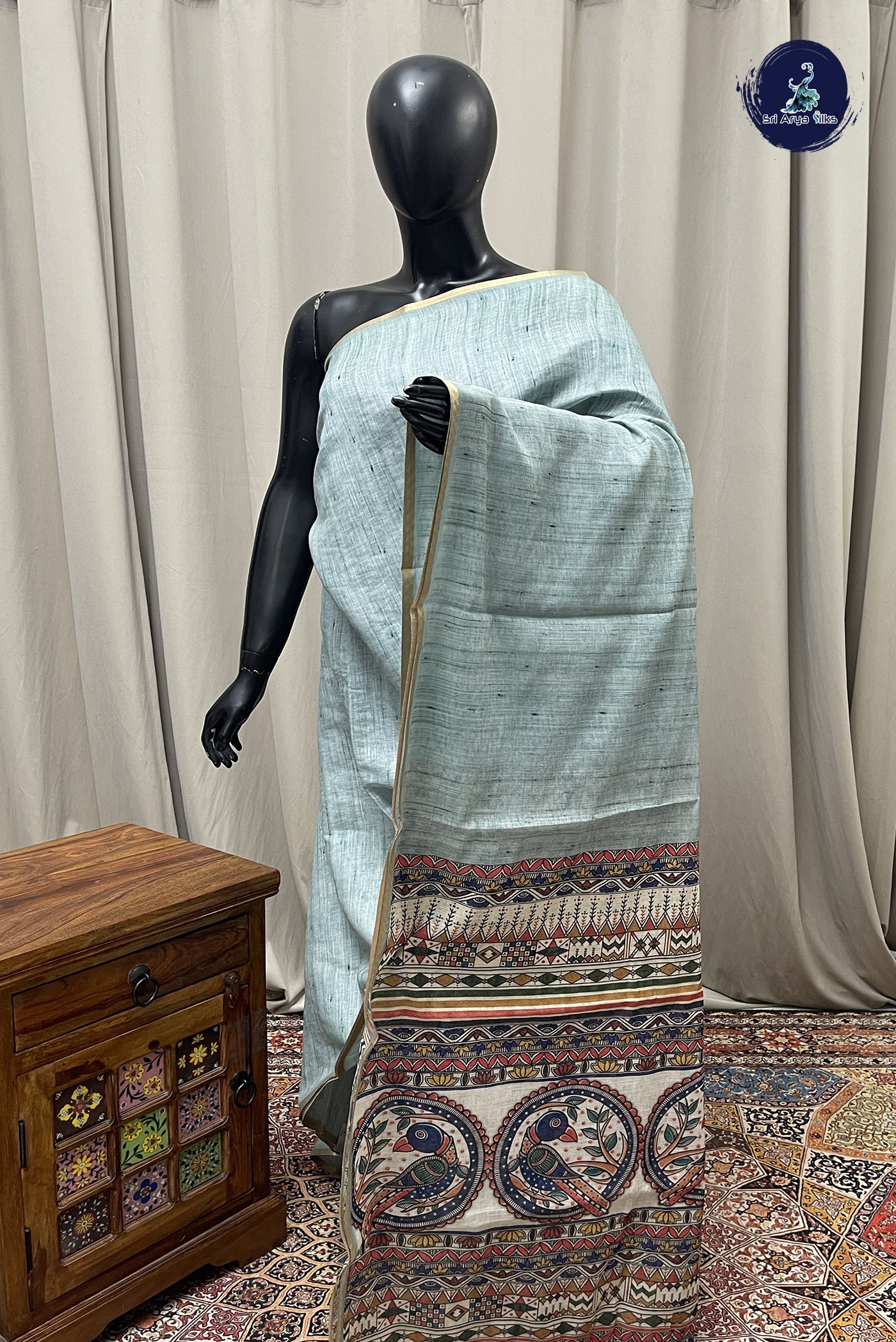 Pastel Green Linen Saree With Plain Pattern