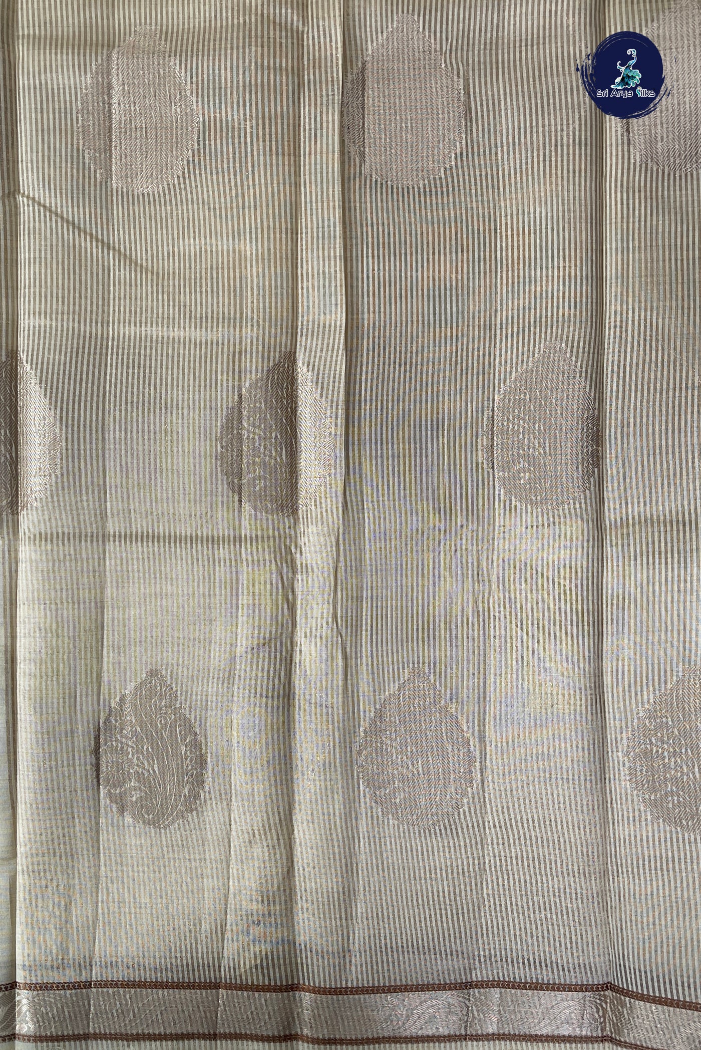 Off White Semi Tussar Saree With Zari Buttas Pattern