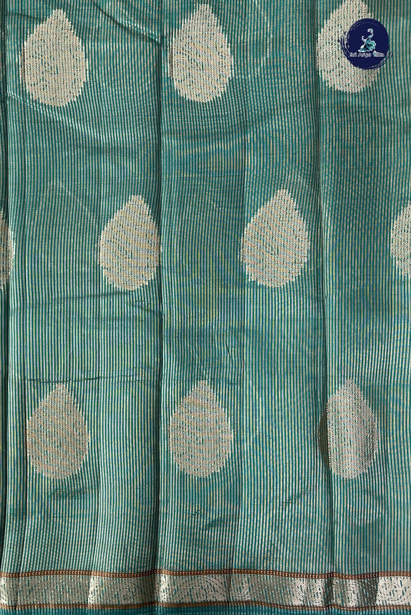 Teal Semi Tussar Saree With Zari Buttas Pattern