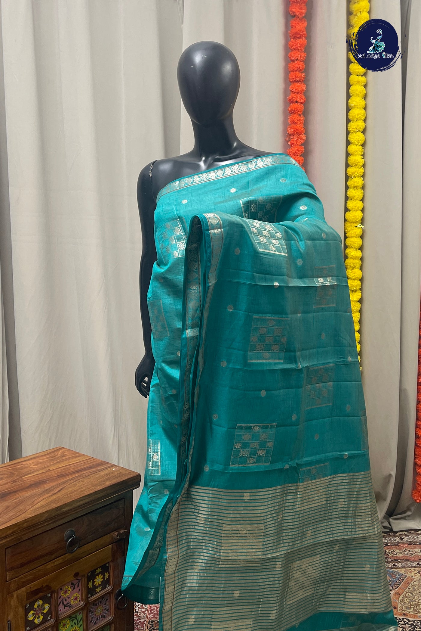 Teal Semi Tussar Saree With Zari Buttas Pattern