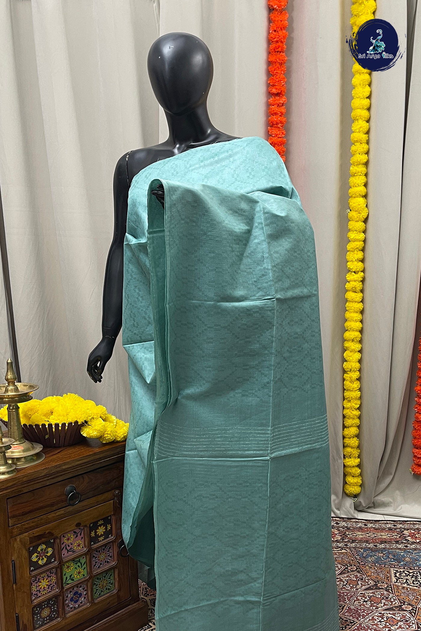 Emerald Green Baswada Saree With Embossed Pattern