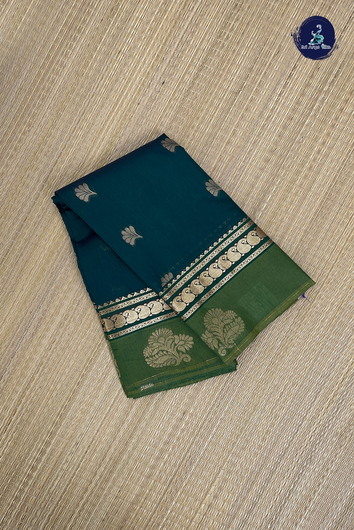 Bottle Green Budget Semi Silk Cotton Saree With Zari Buttas Pattern