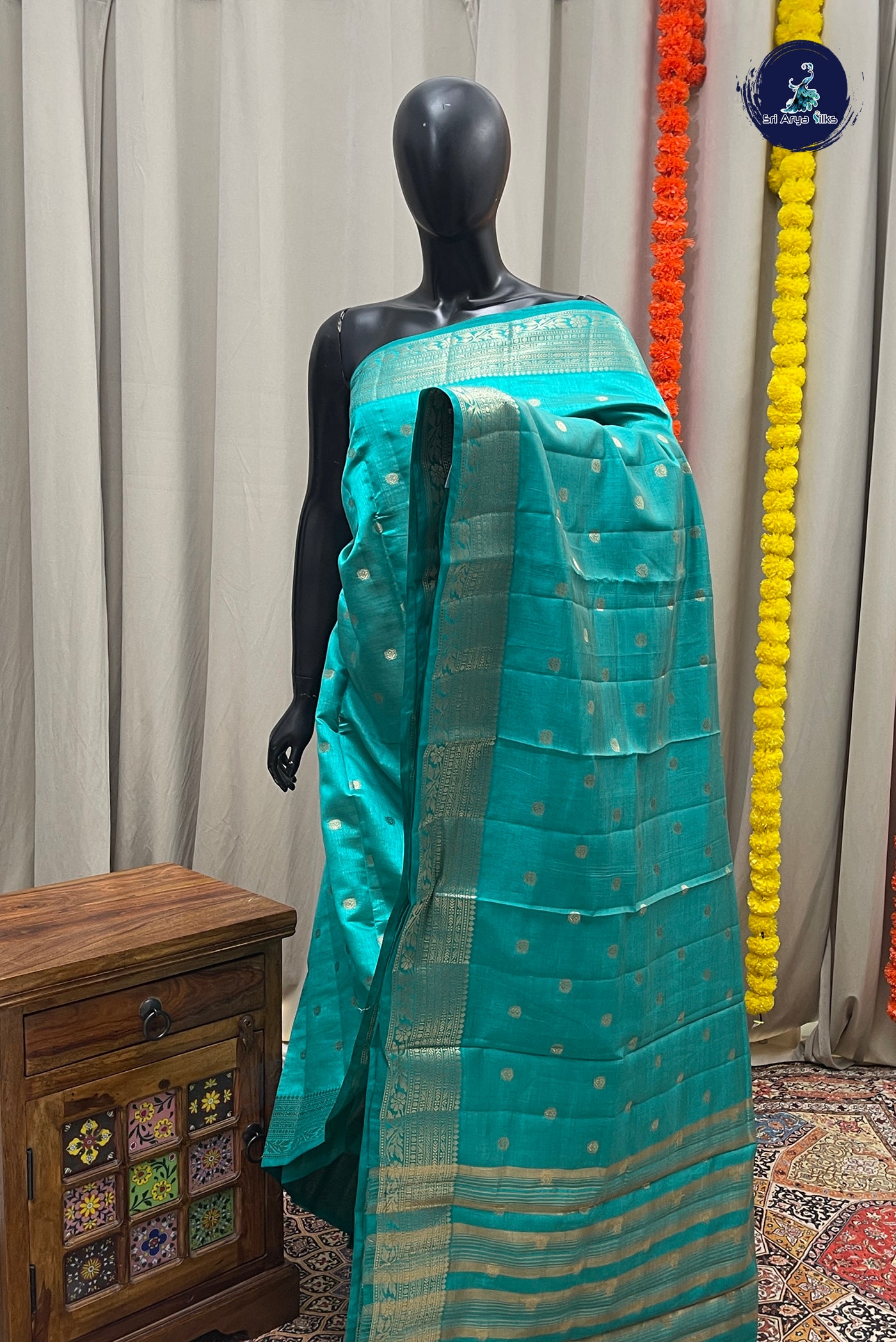 Teal Semi Tussar Saree With Zari Buttas Pattern