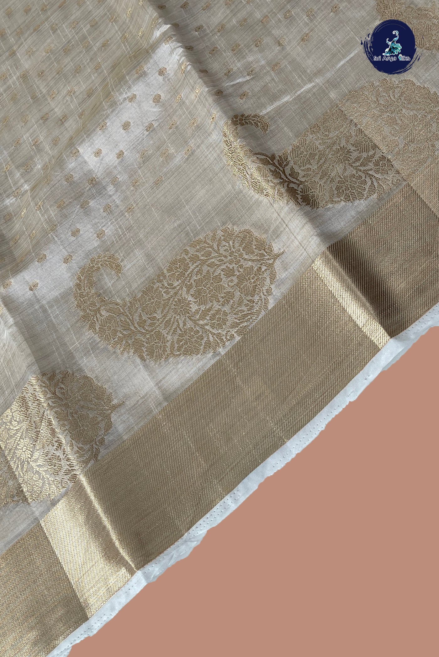 Off White Semi Tussar Saree With Zari Buttas Pattern