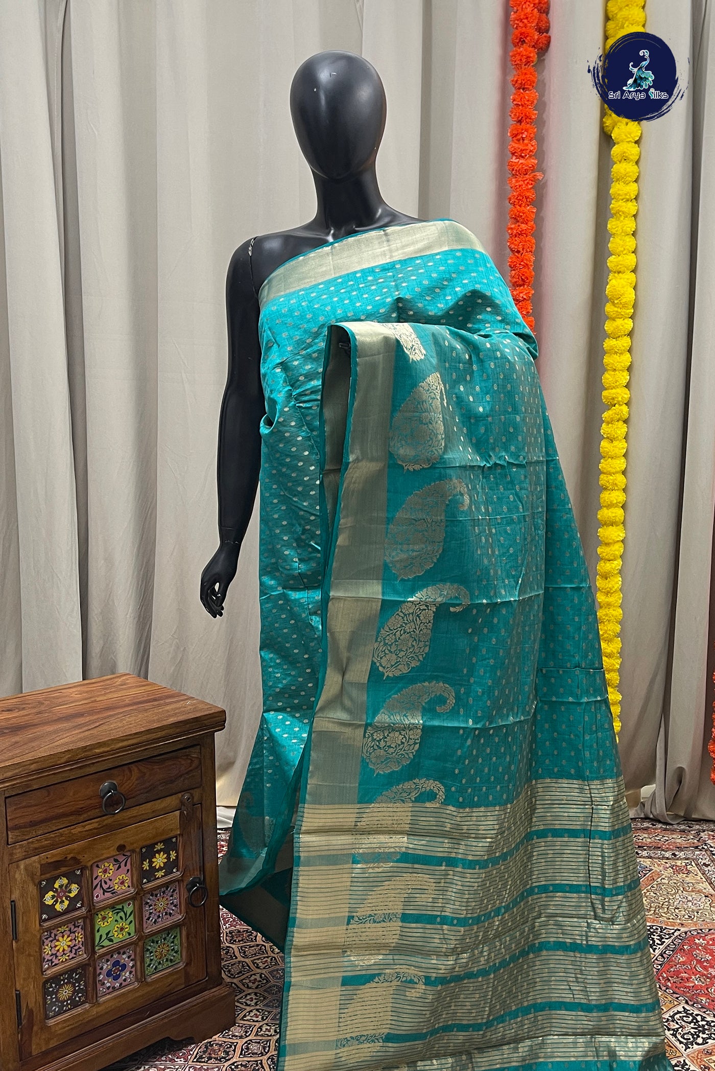 Teal Semi Tussar Saree With Zari Buttas Pattern