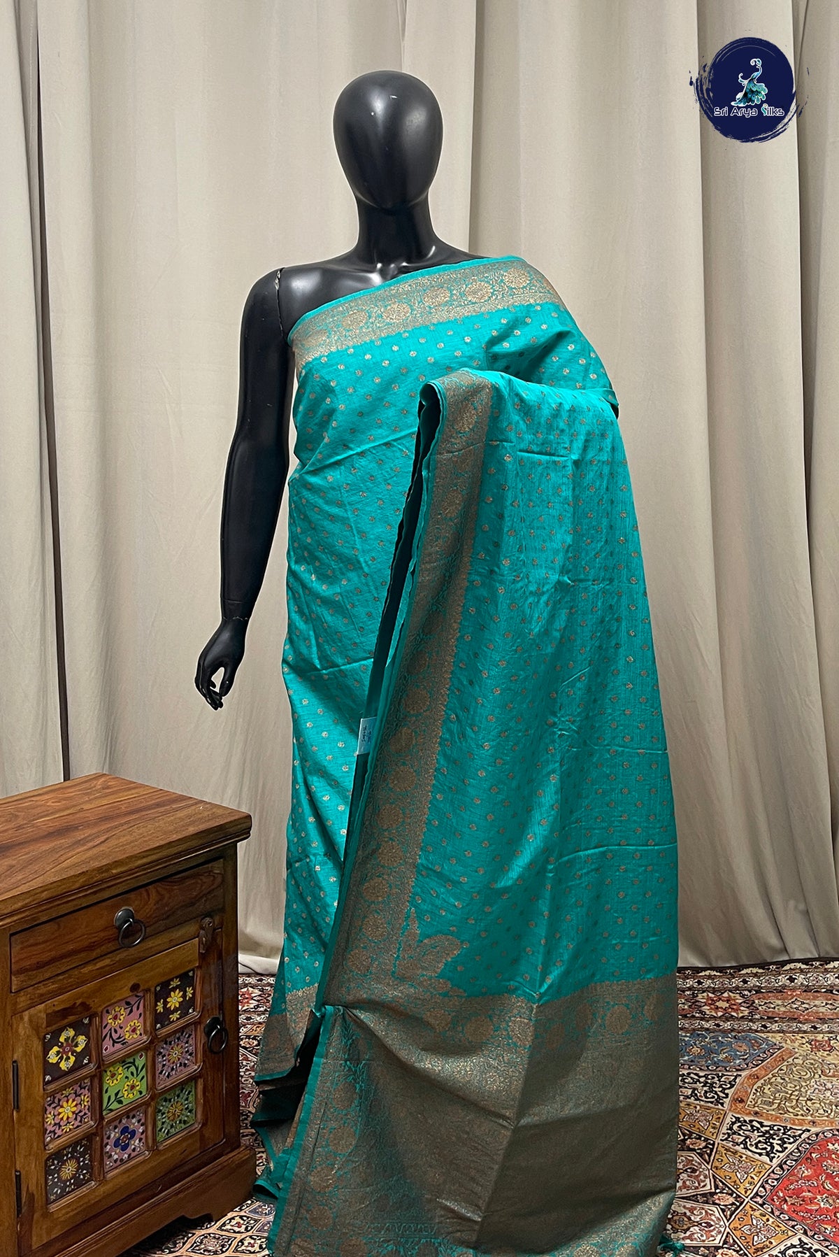 Teal Semi Tussar Saree With Zari Buttas Pattern