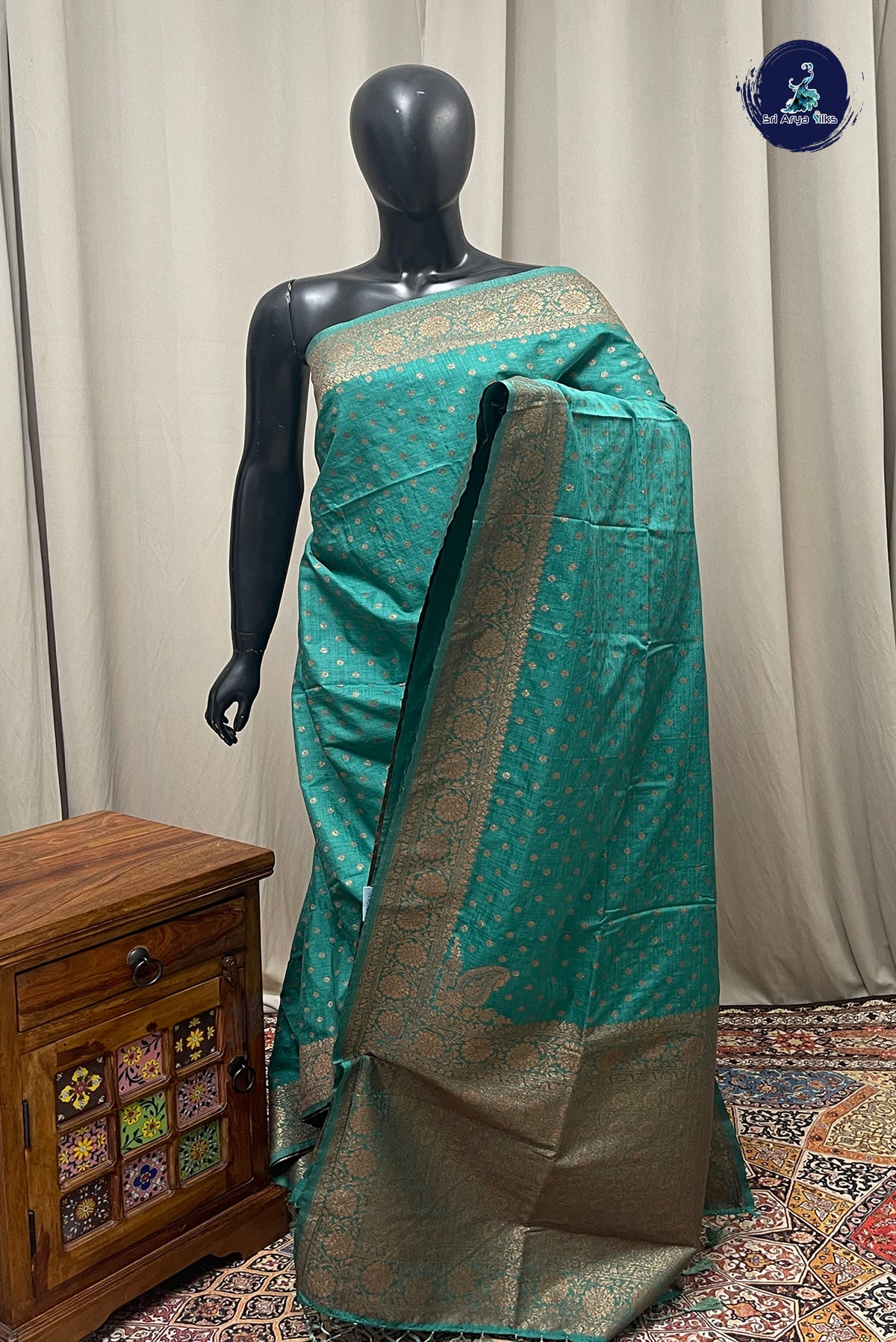 Teal Semi Tussar Saree With Zari Buttas Pattern