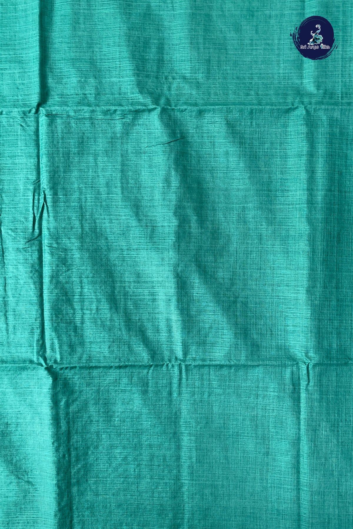 Teal Semi Tussar Saree With Zari Buttas Pattern