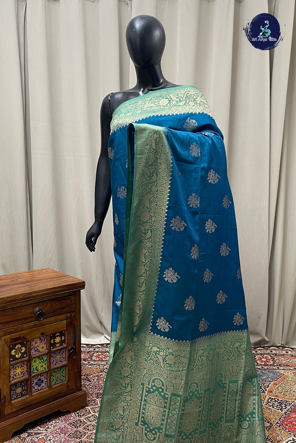 Teal Blue Semi Raw Silk Saree With Zari Buttas Pattern