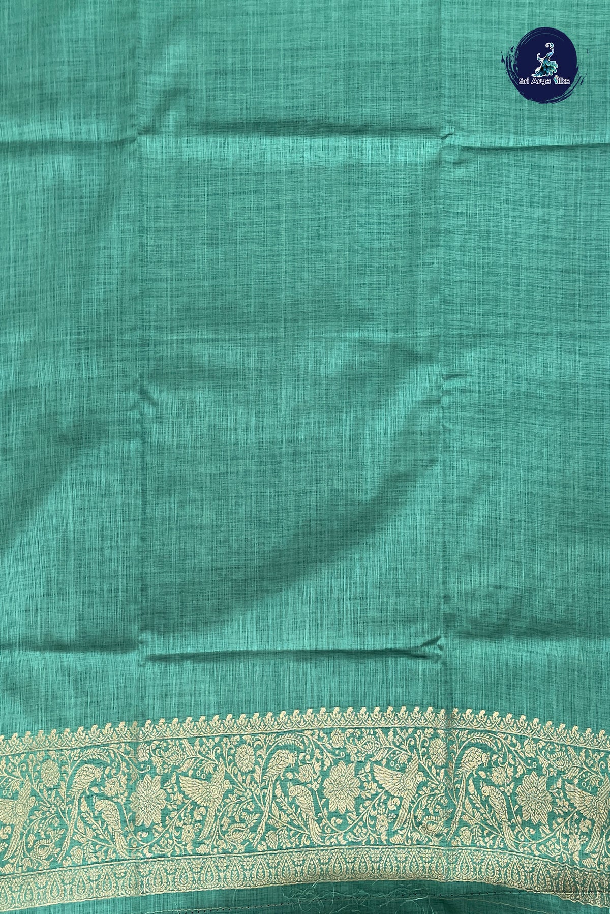 Teal Blue Semi Raw Silk Saree With Zari Buttas Pattern