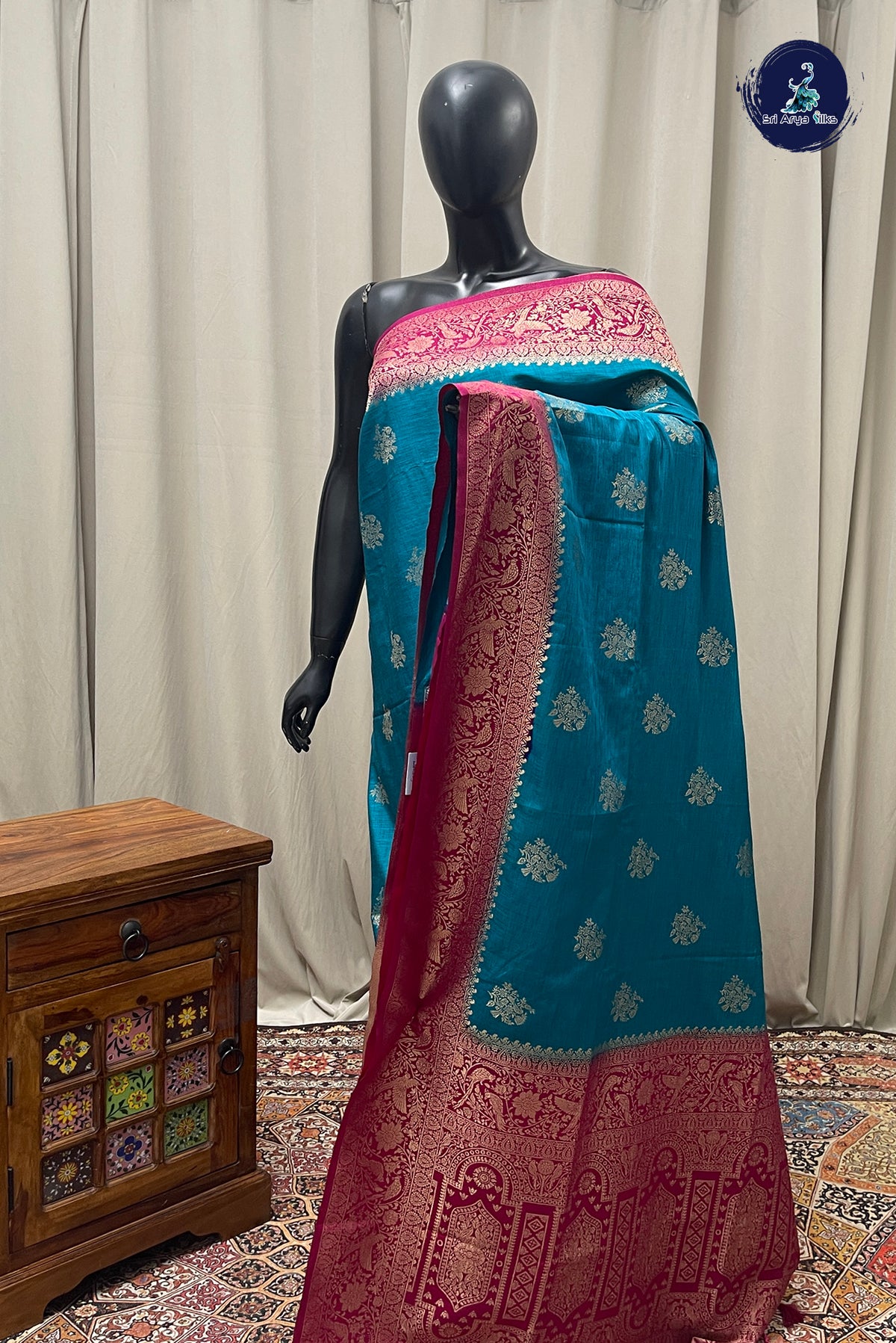 Teal Blue Semi Raw Silk Saree With Zari Buttas Pattern