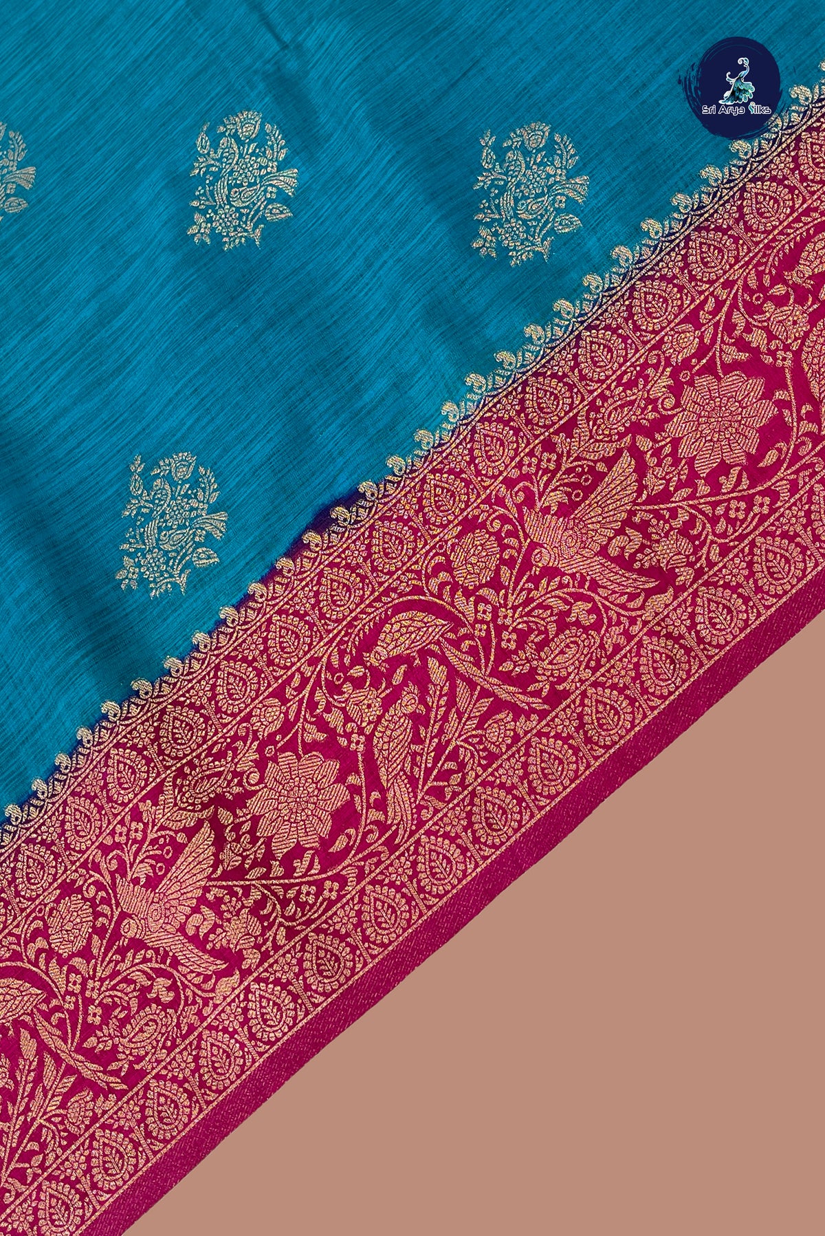Teal Blue Semi Raw Silk Saree With Zari Buttas Pattern