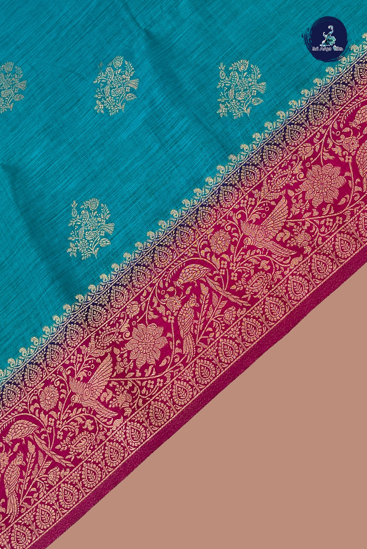 Teal Blue Semi Raw Silk Saree With Zari Buttas Pattern