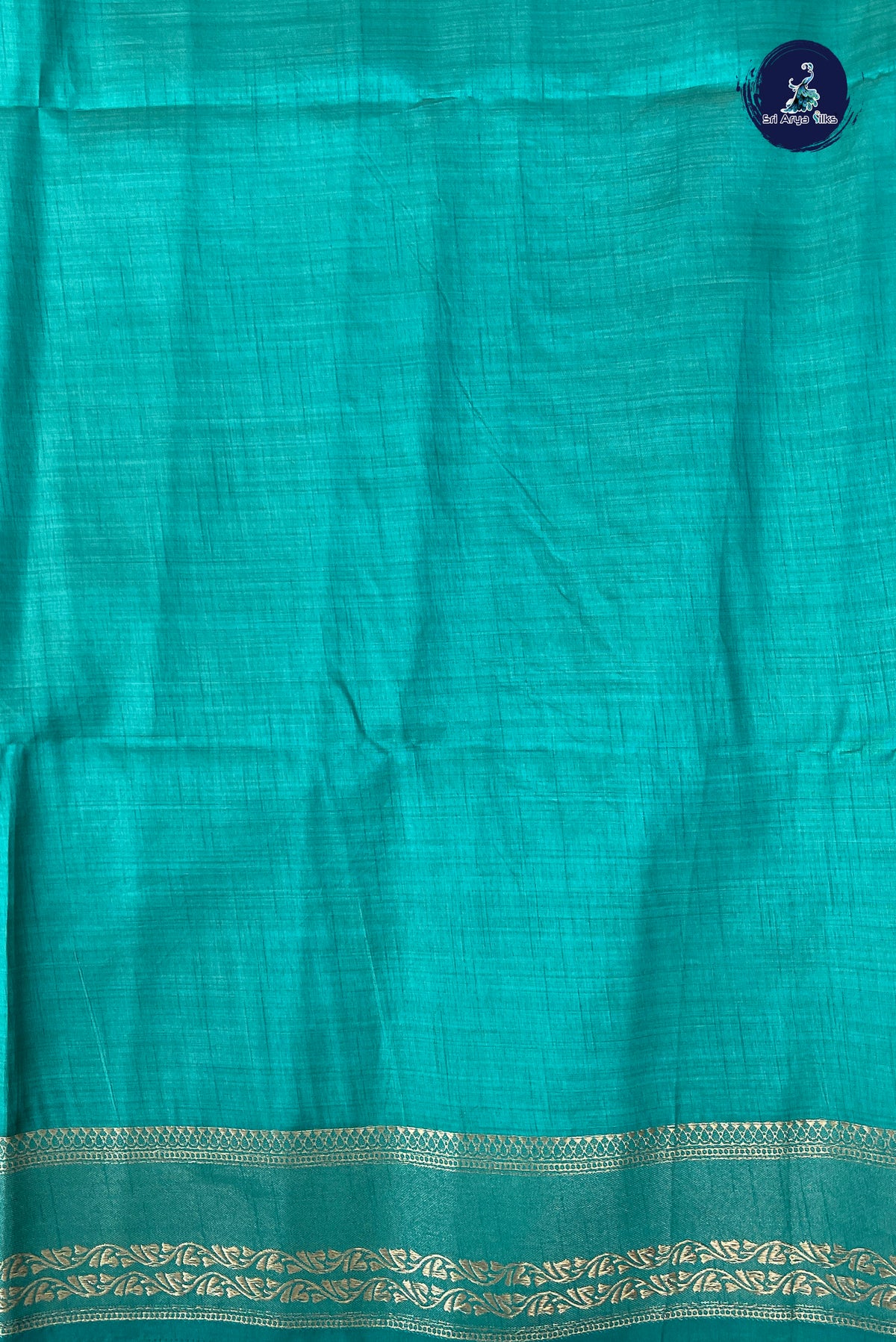 Teal Semi Tussar Saree With Zari Buttas Pattern