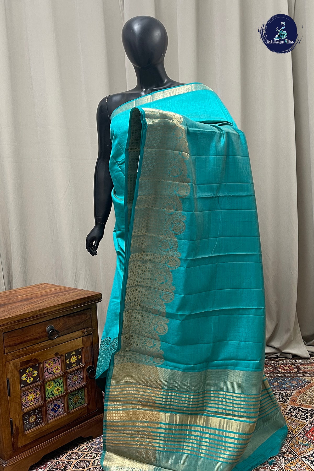 Teal Semi Tussar Saree With Plain Pattern
