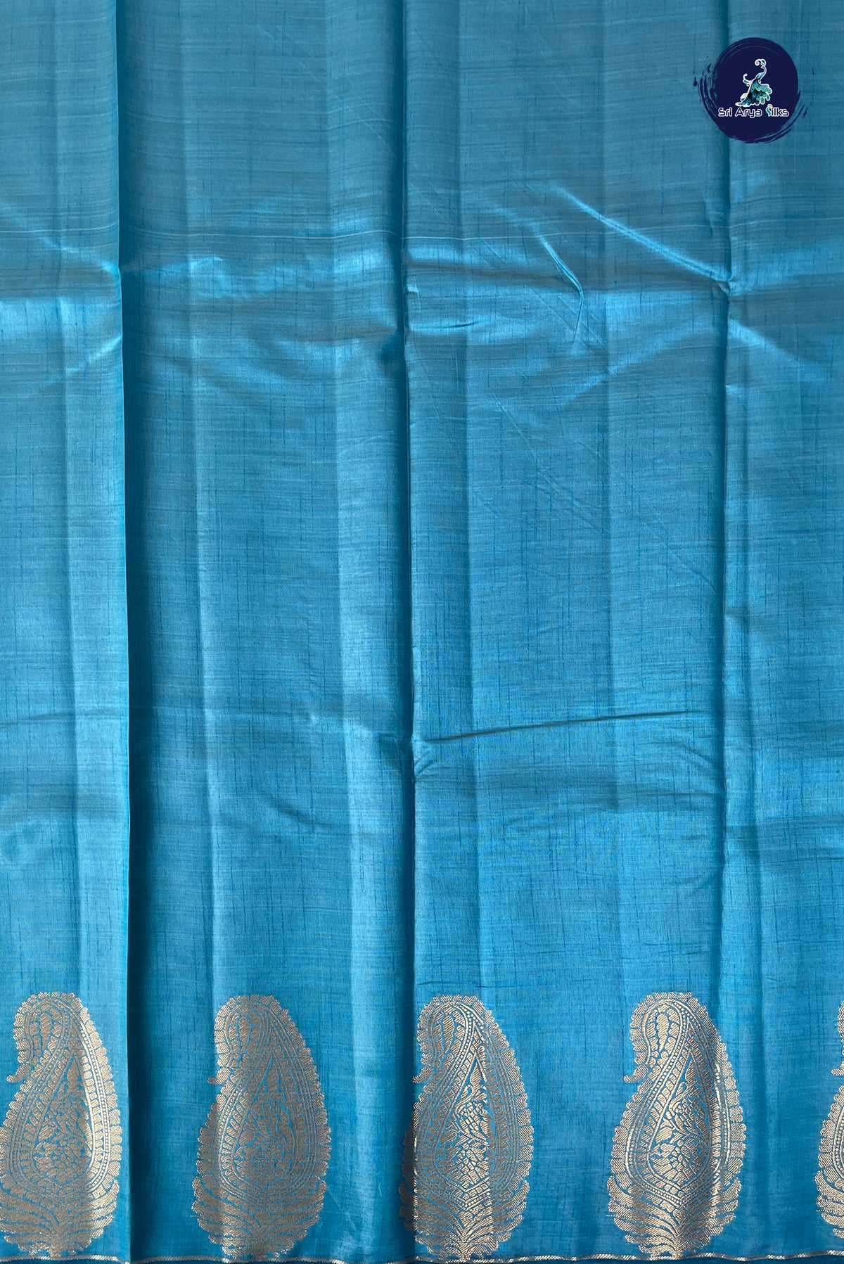 Teal Blue Semi Tussar Saree With Plain Pattern
