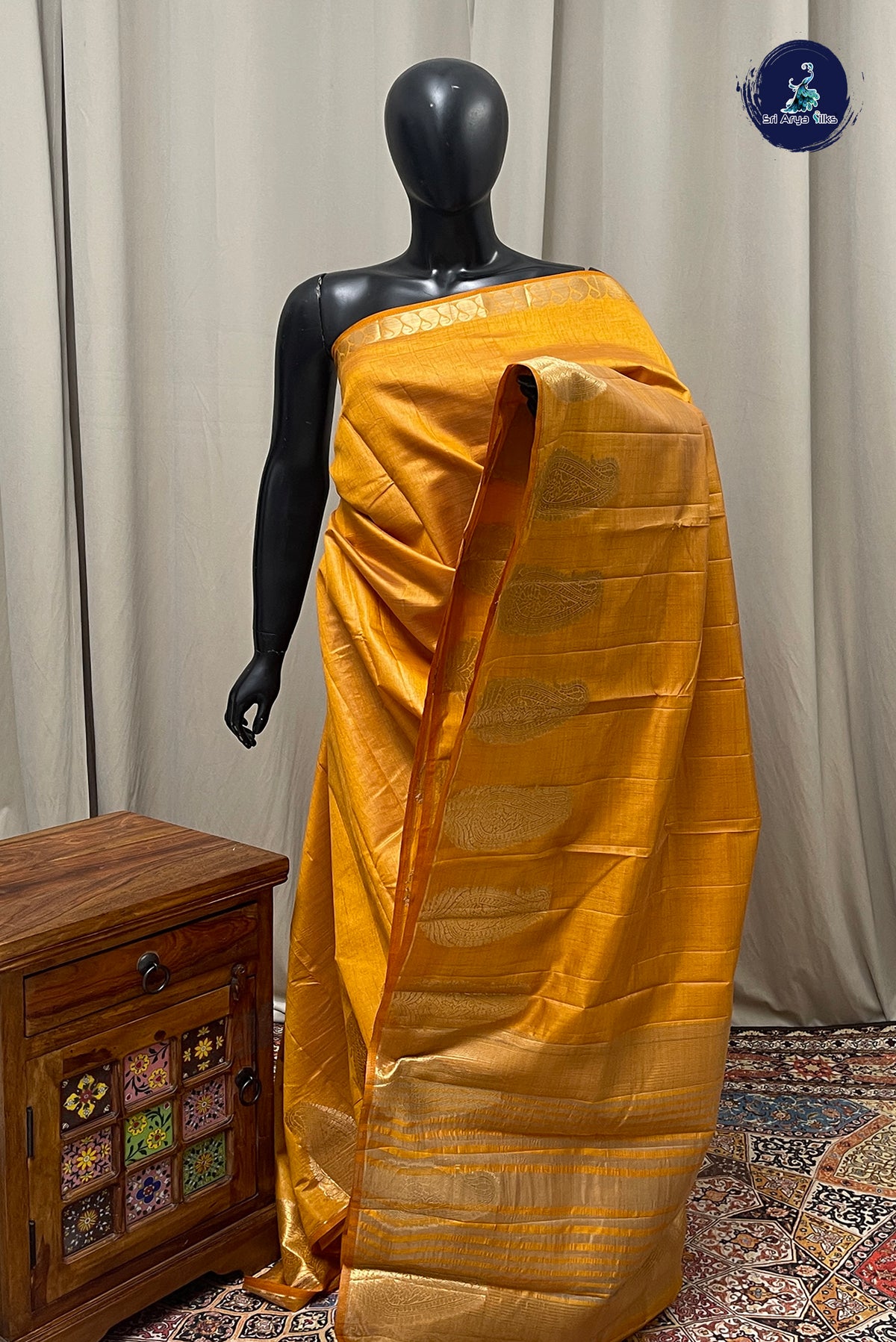 Lite Mustard Orange Semi Tussar Saree With Plain Pattern