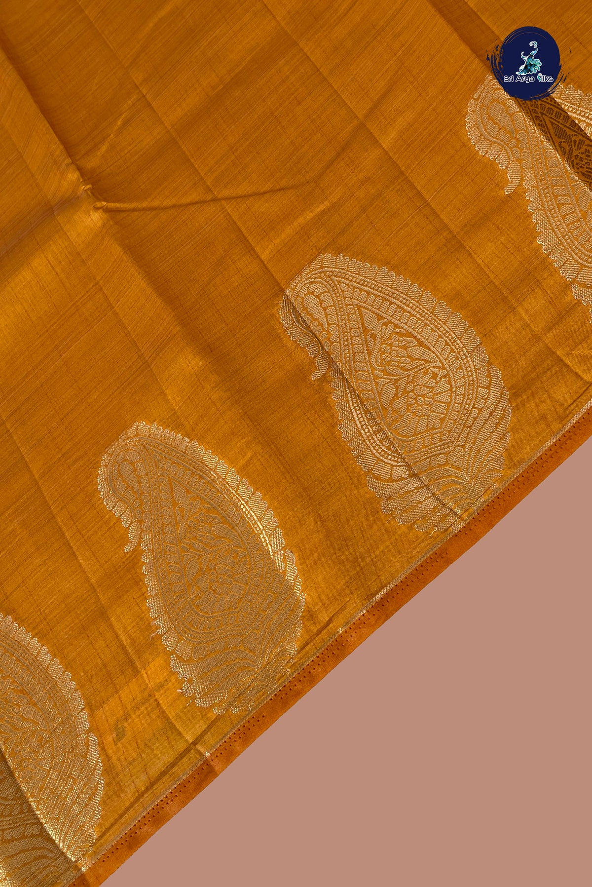 Lite Mustard Orange Semi Tussar Saree With Plain Pattern