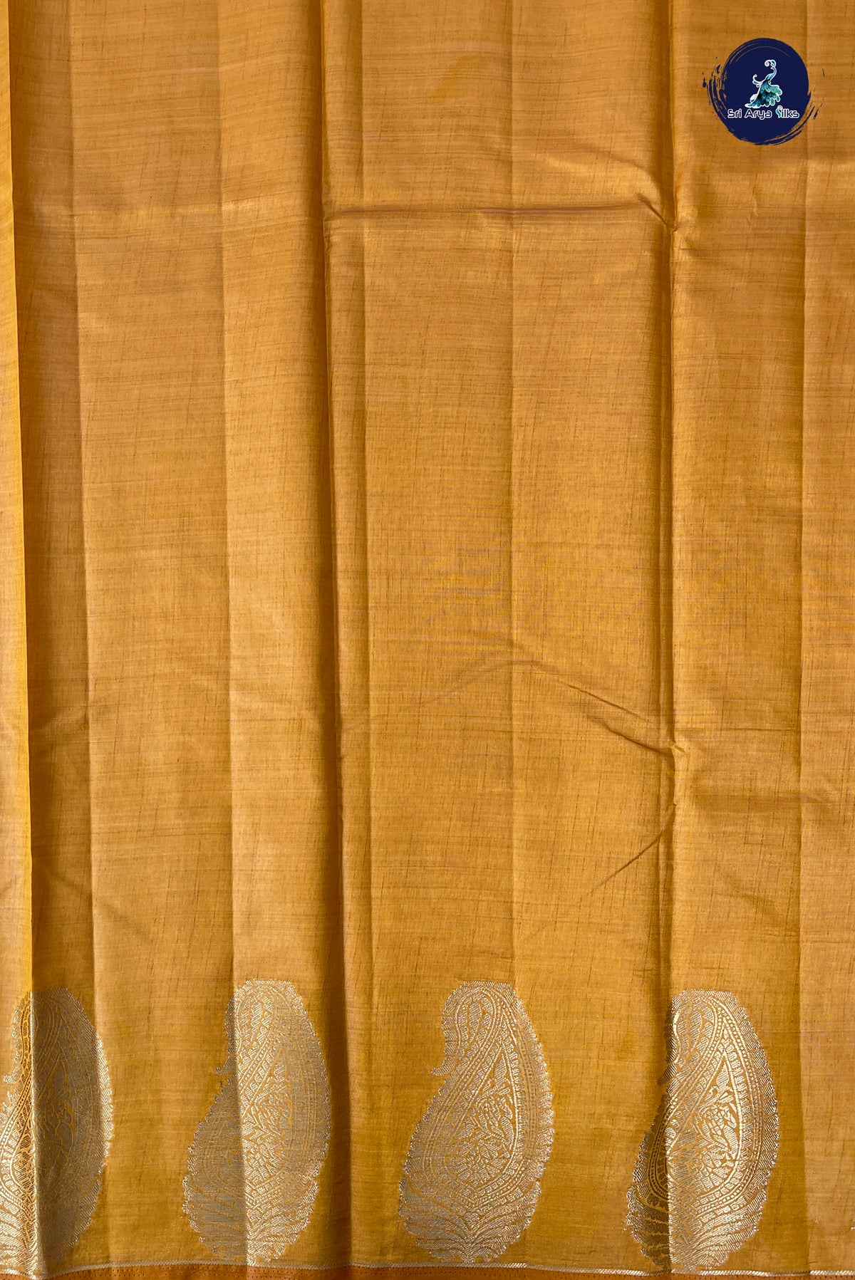 Lite Mustard Orange Semi Tussar Saree With Plain Pattern